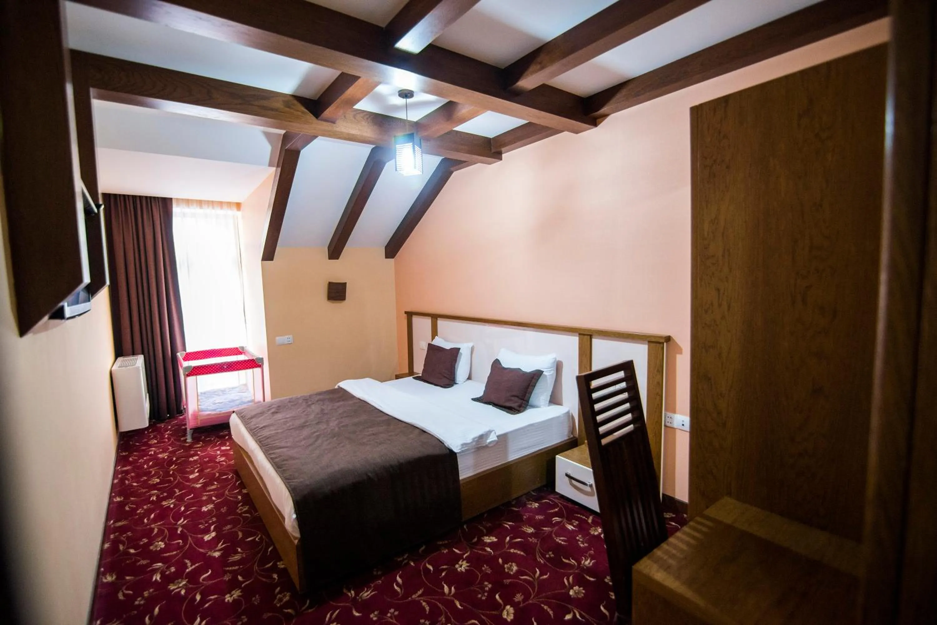 Bed in Elegant Hotel & Resort