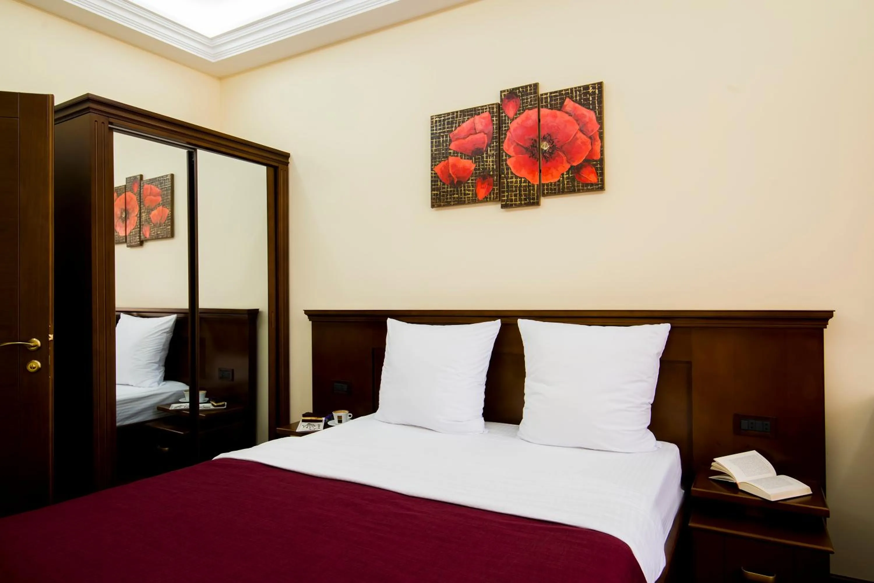 Bed in Elegant Hotel & Resort