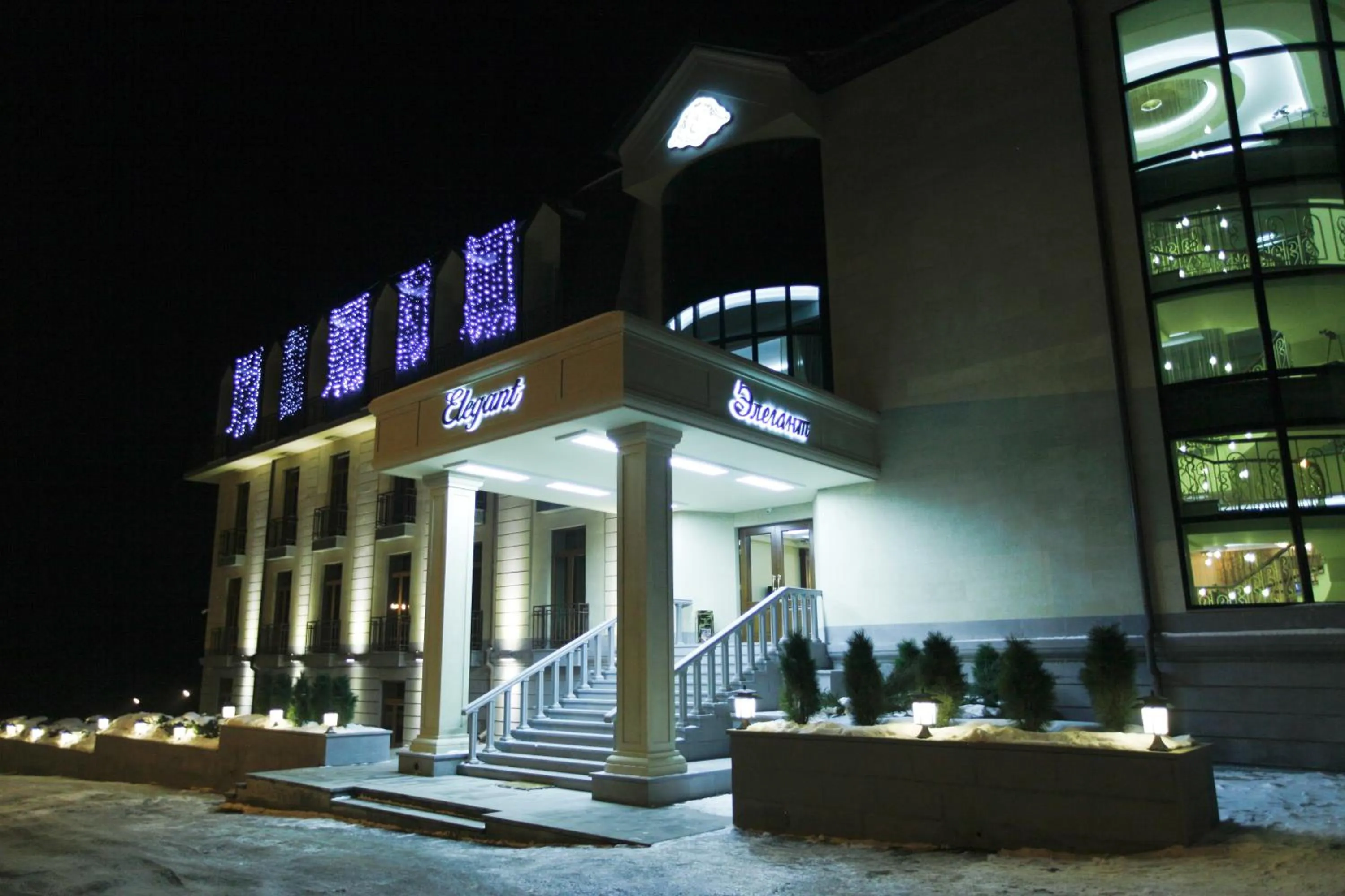 Property logo or sign in Elegant Hotel & Resort