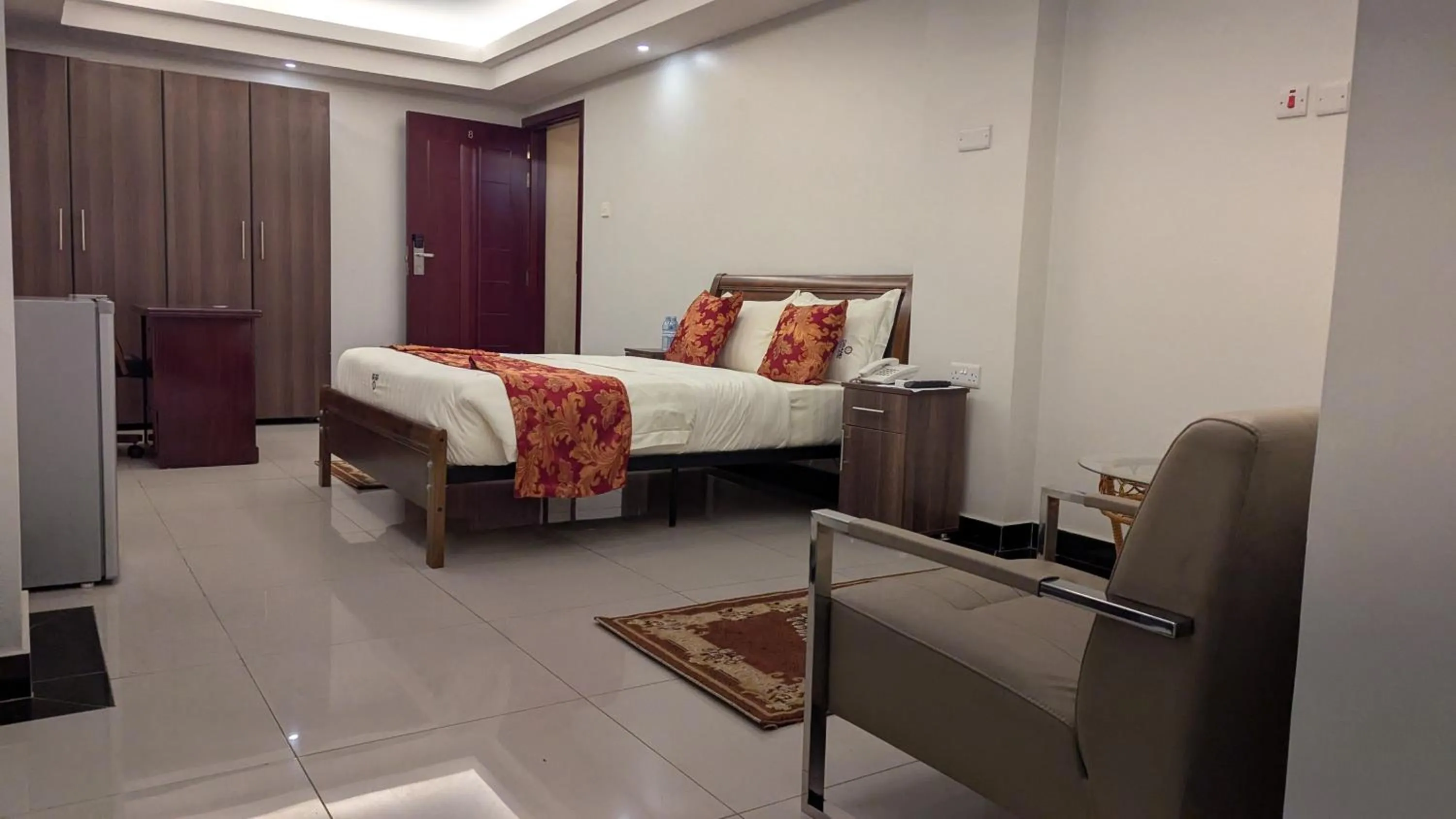 Photo of the whole room, Bed in The Grand Plaza Hotel