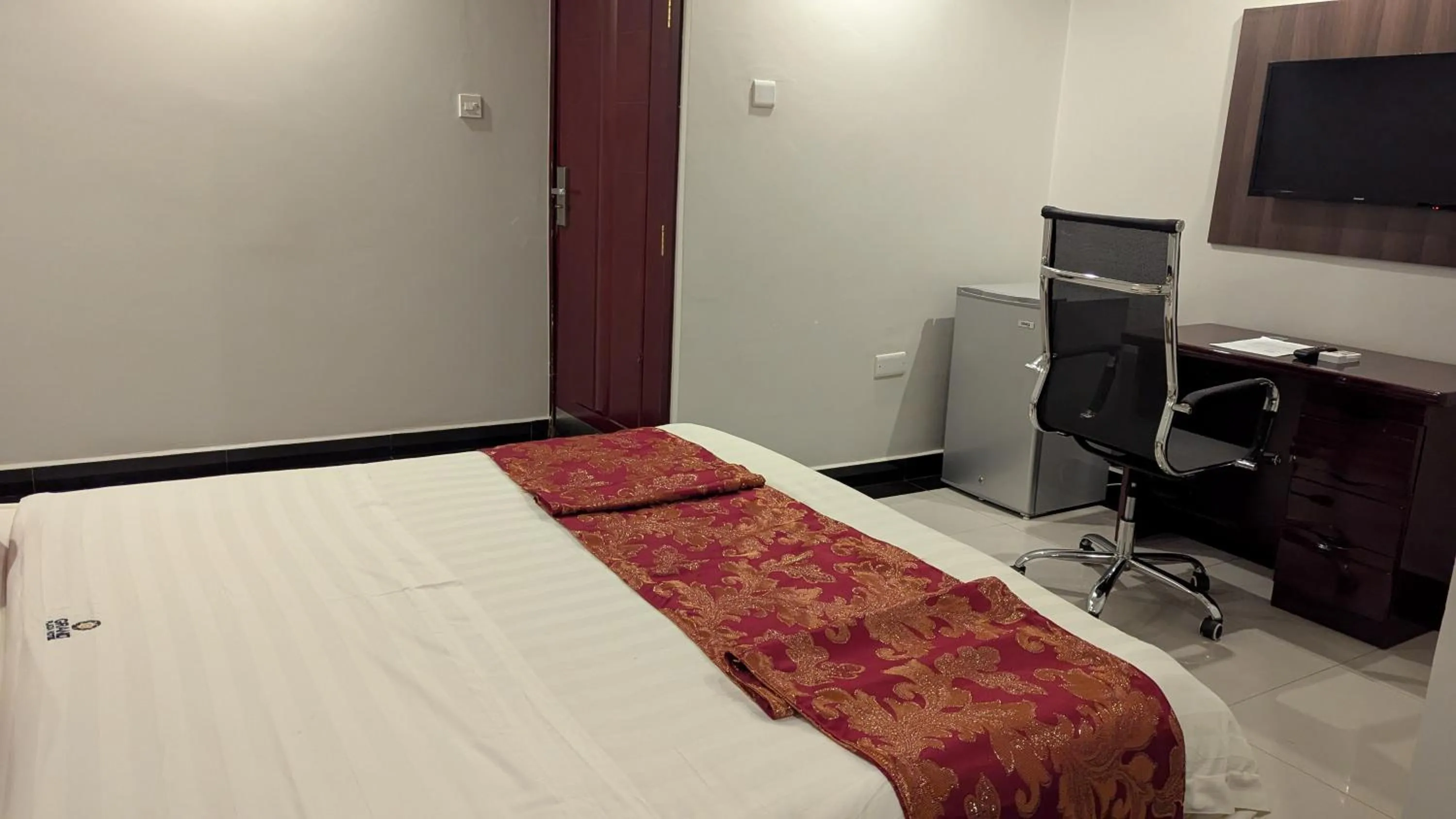 Bed in The Grand Plaza Hotel