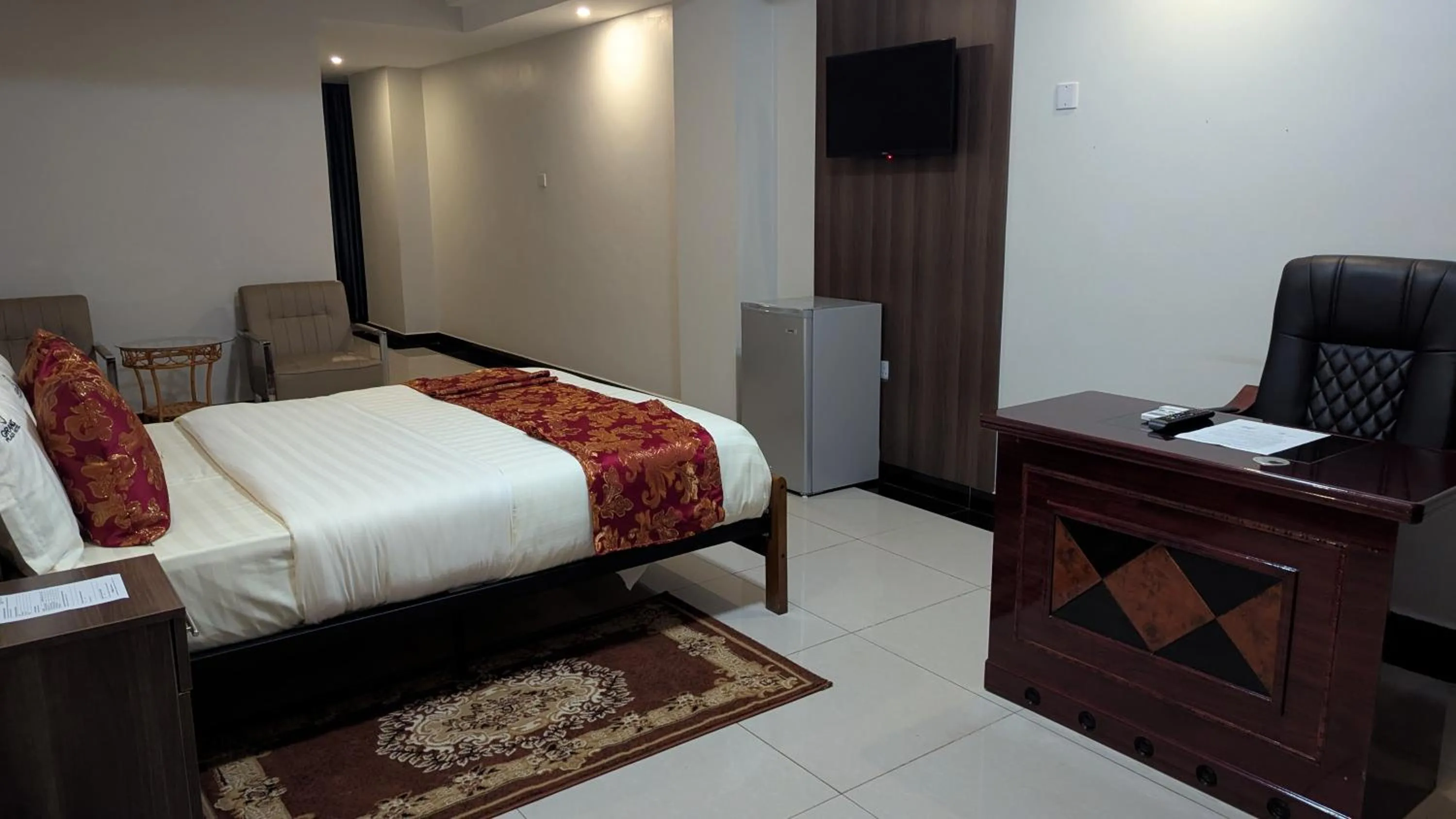 Bed in The Grand Plaza Hotel