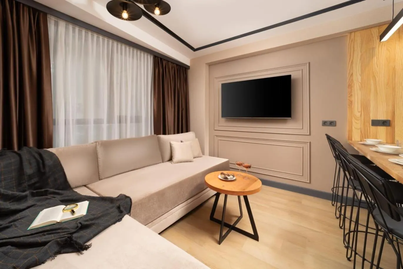 Communal lounge/ TV room in Şişli Family Time Suites