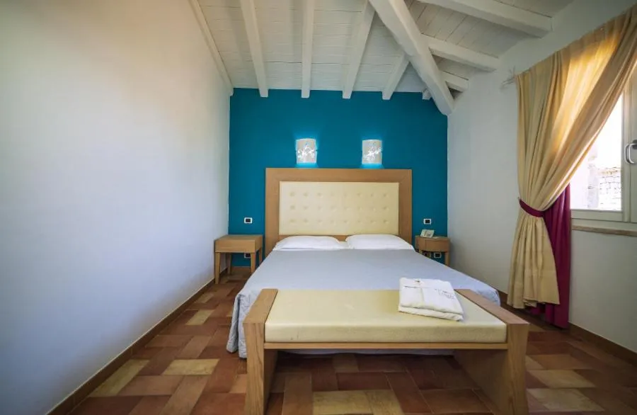 Bed in Nicolaus Prime Villas Resort