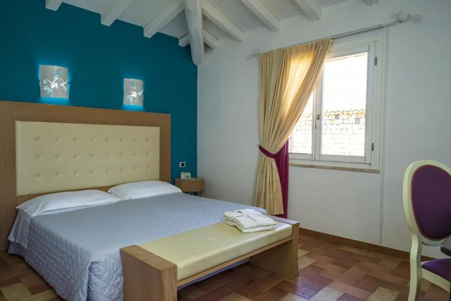 Bed in Nicolaus Prime Villas Resort