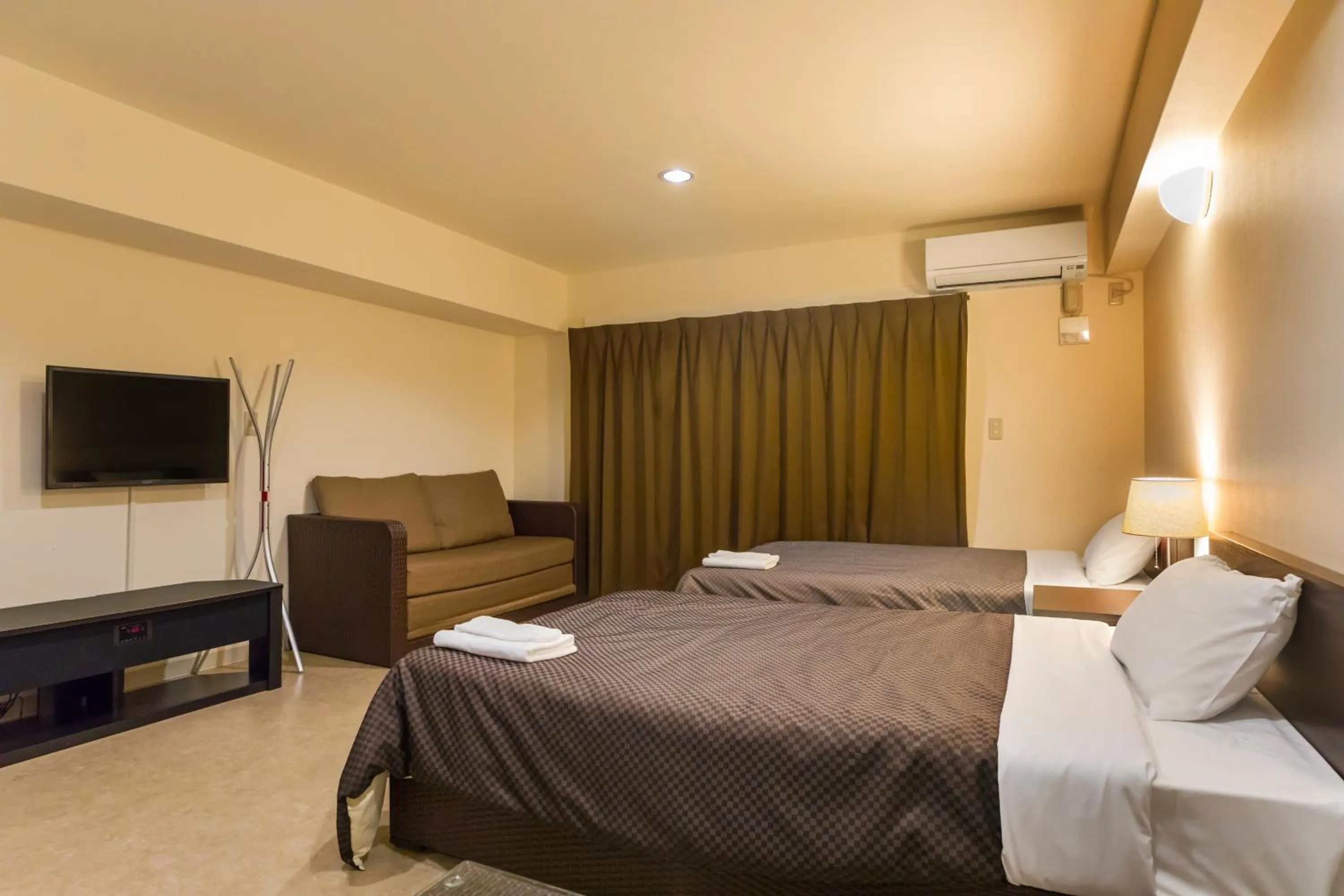 Photo of the whole room, Bed in Condominium Hotel Monpa