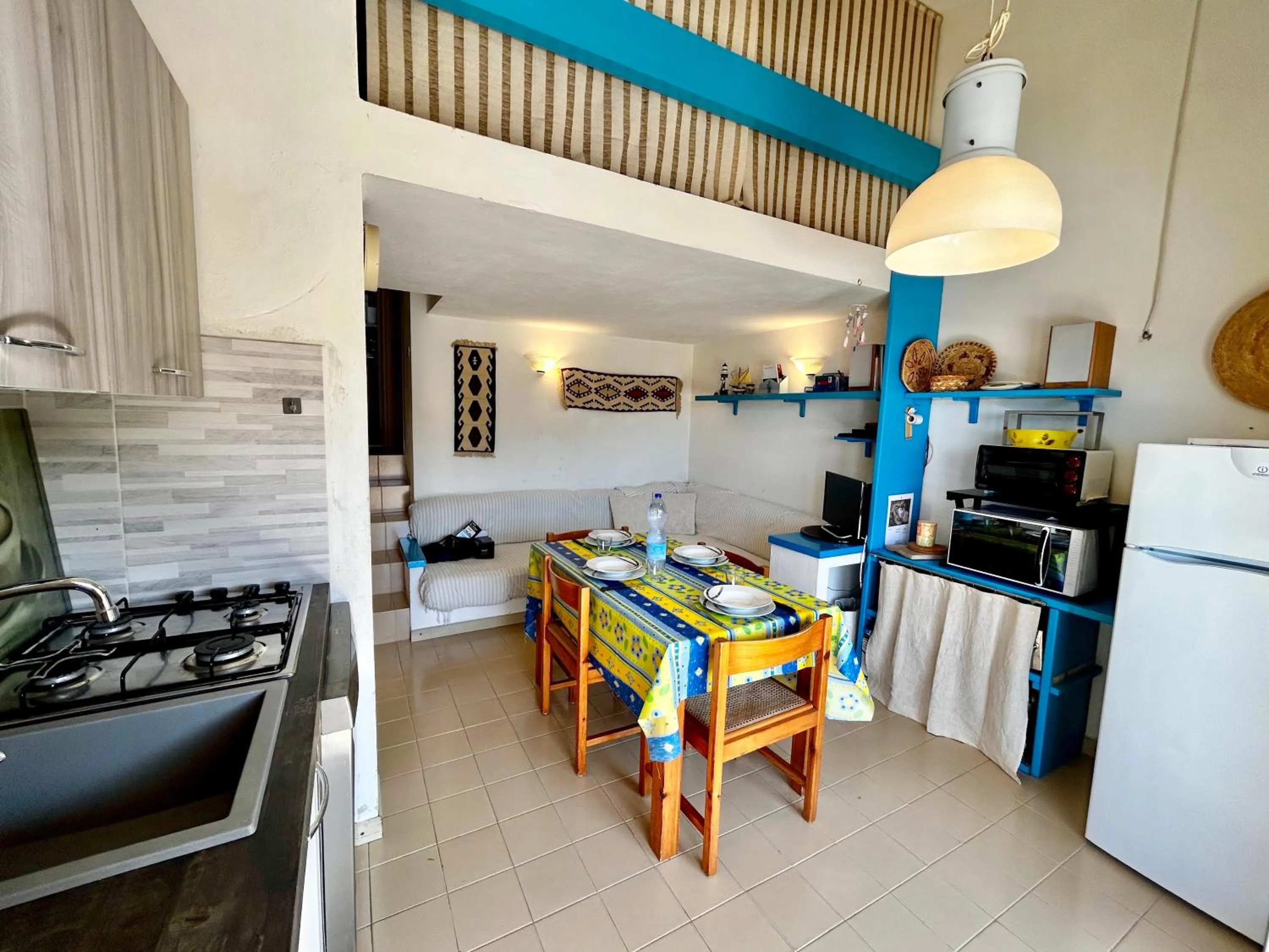 Kitchen or kitchenette in ISA-Residence with swimming-pool in Costa Paradiso, apartments 6 beds with private outdoor area