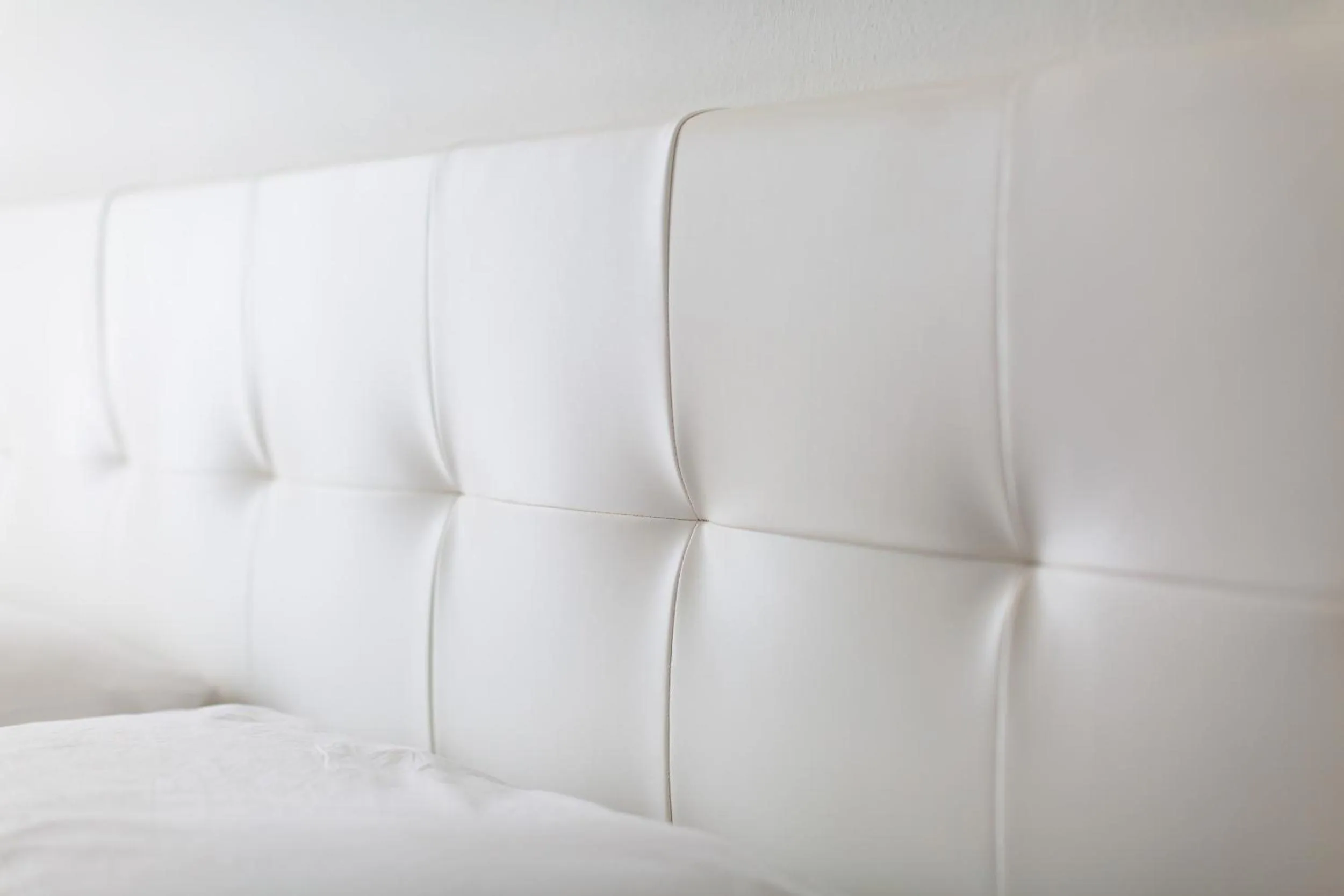 Decorative detail, Bed in Hotel Cavallino Bianco