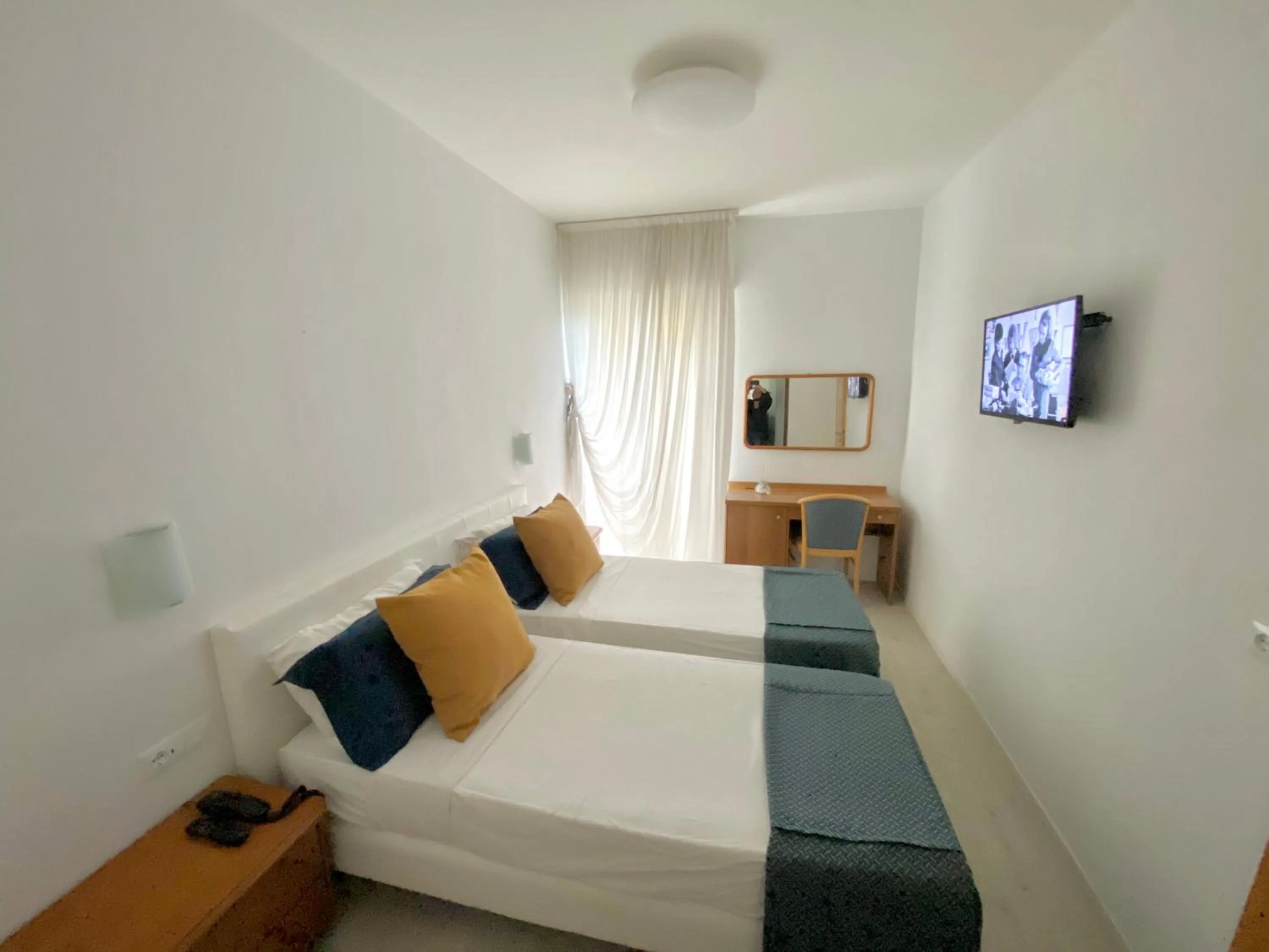 Bed in Hotel Cavallino Bianco