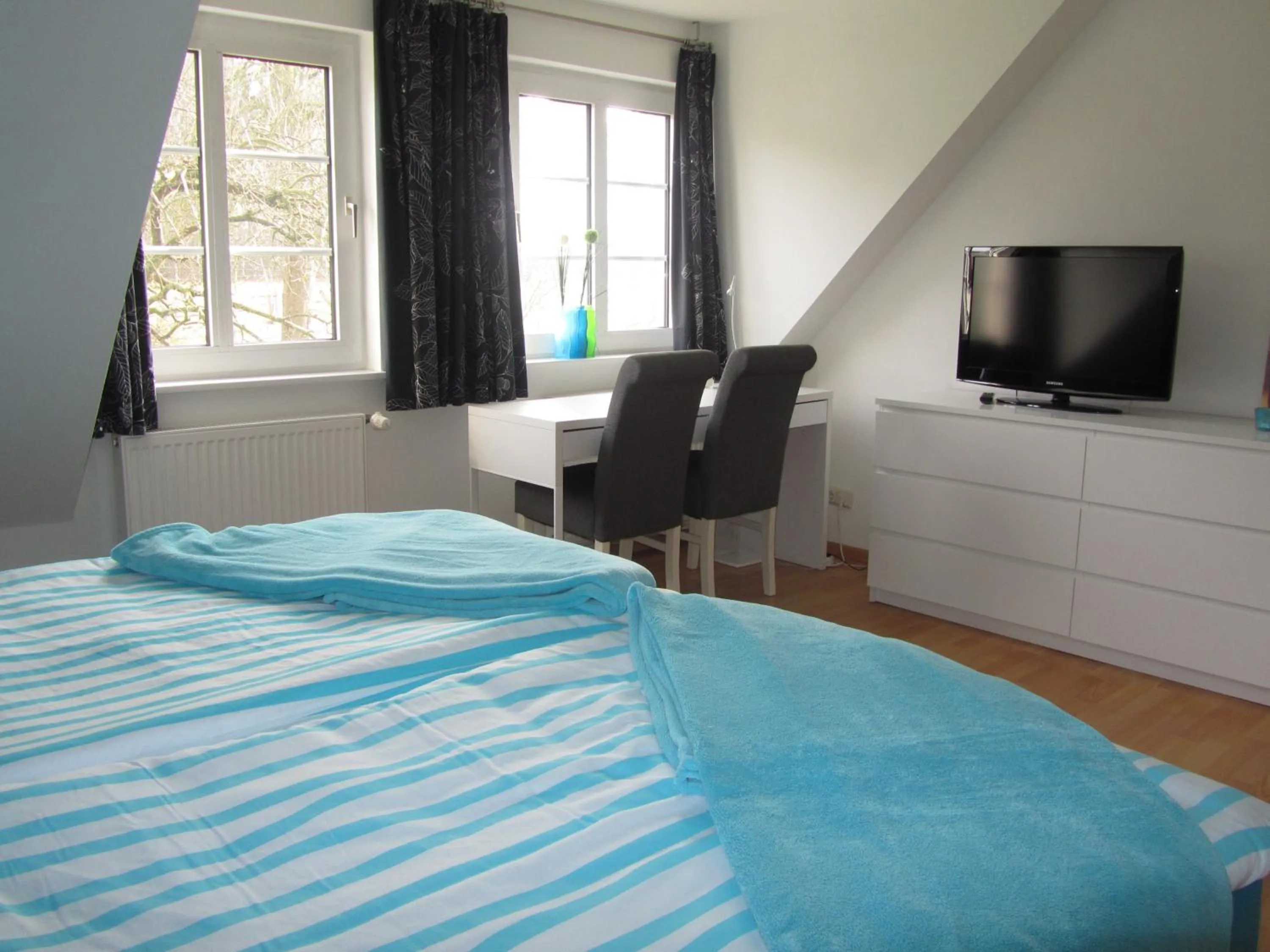 Photo of the whole room, Bed in Ferienwohnung Holt