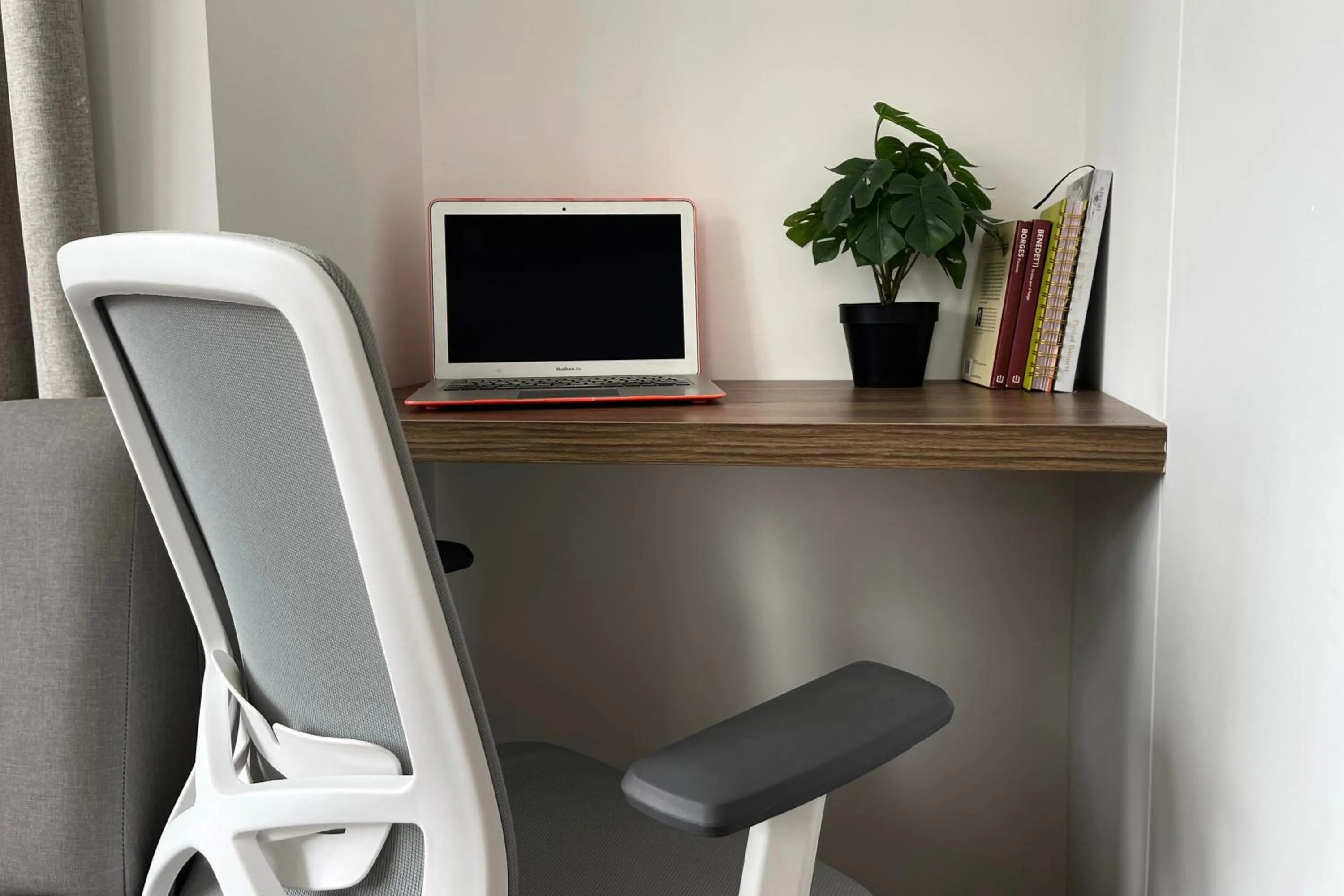 Seating area in VOU Suites by Avia Suites