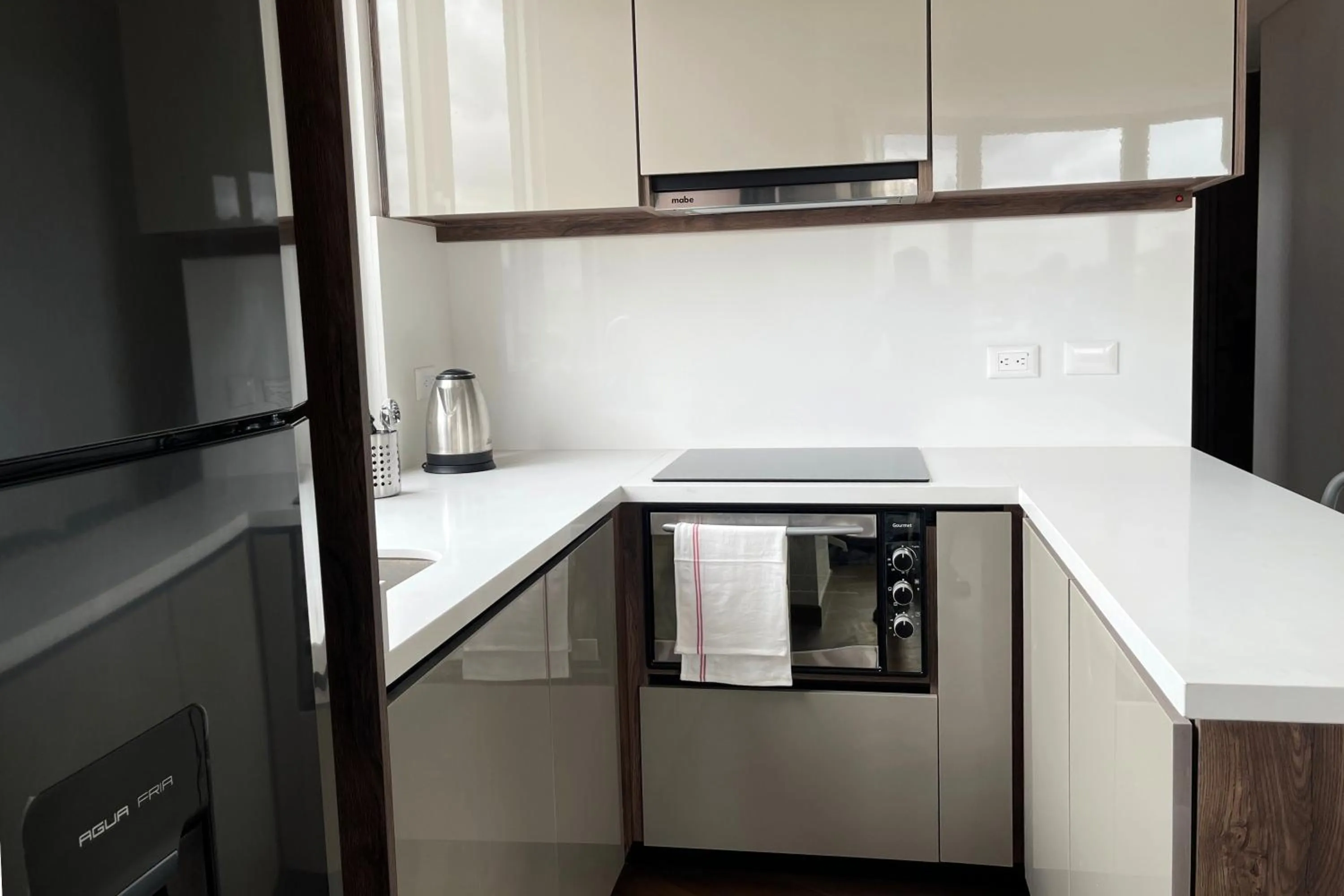 Kitchen or kitchenette in VOU Suites by Avia Suites