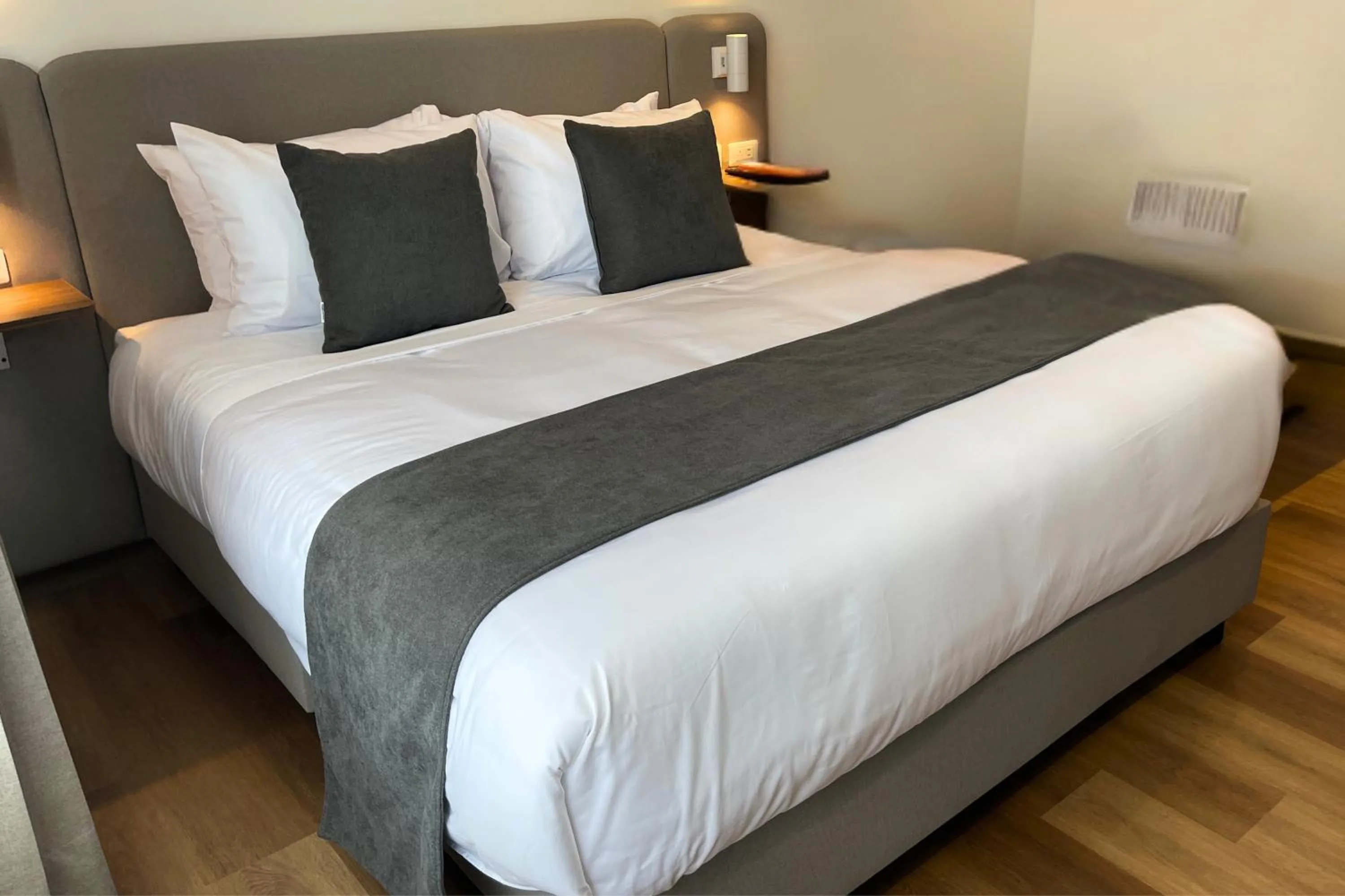 Bed in VOU Suites by Avia Suites