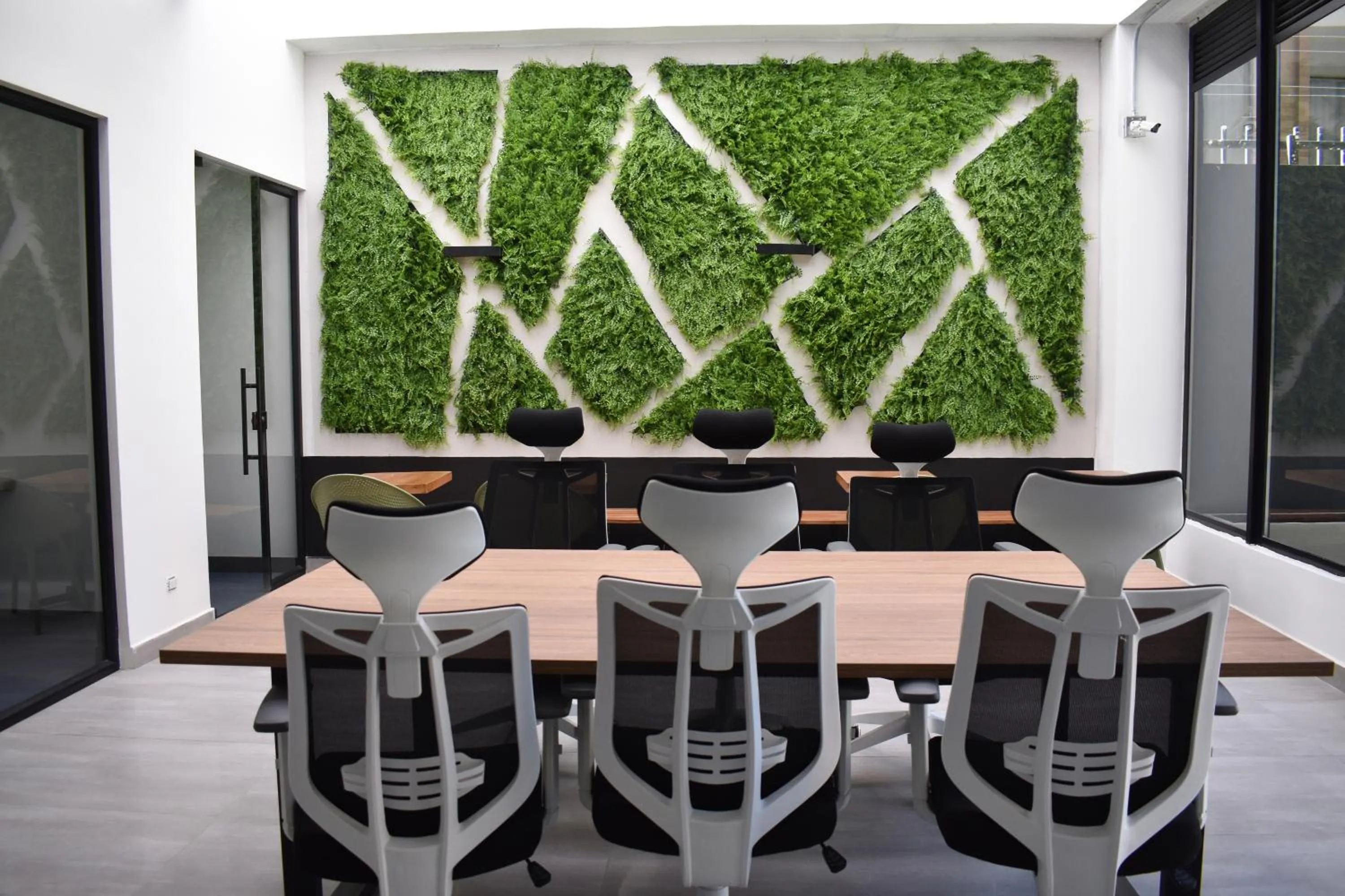 Seating area in VOU Suites by Avia Suites