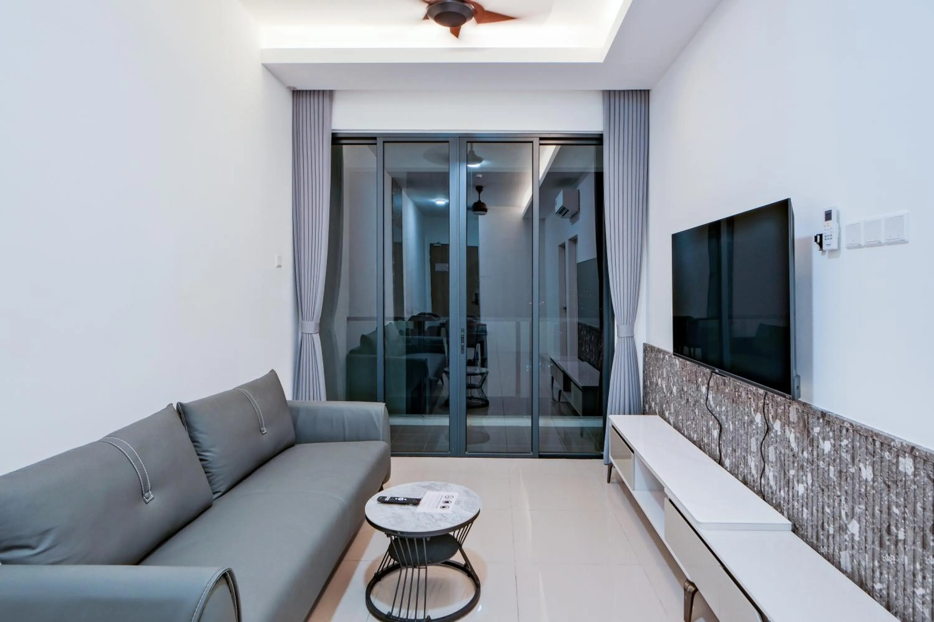 Communal lounge/ TV room in G Residence Sky Suite