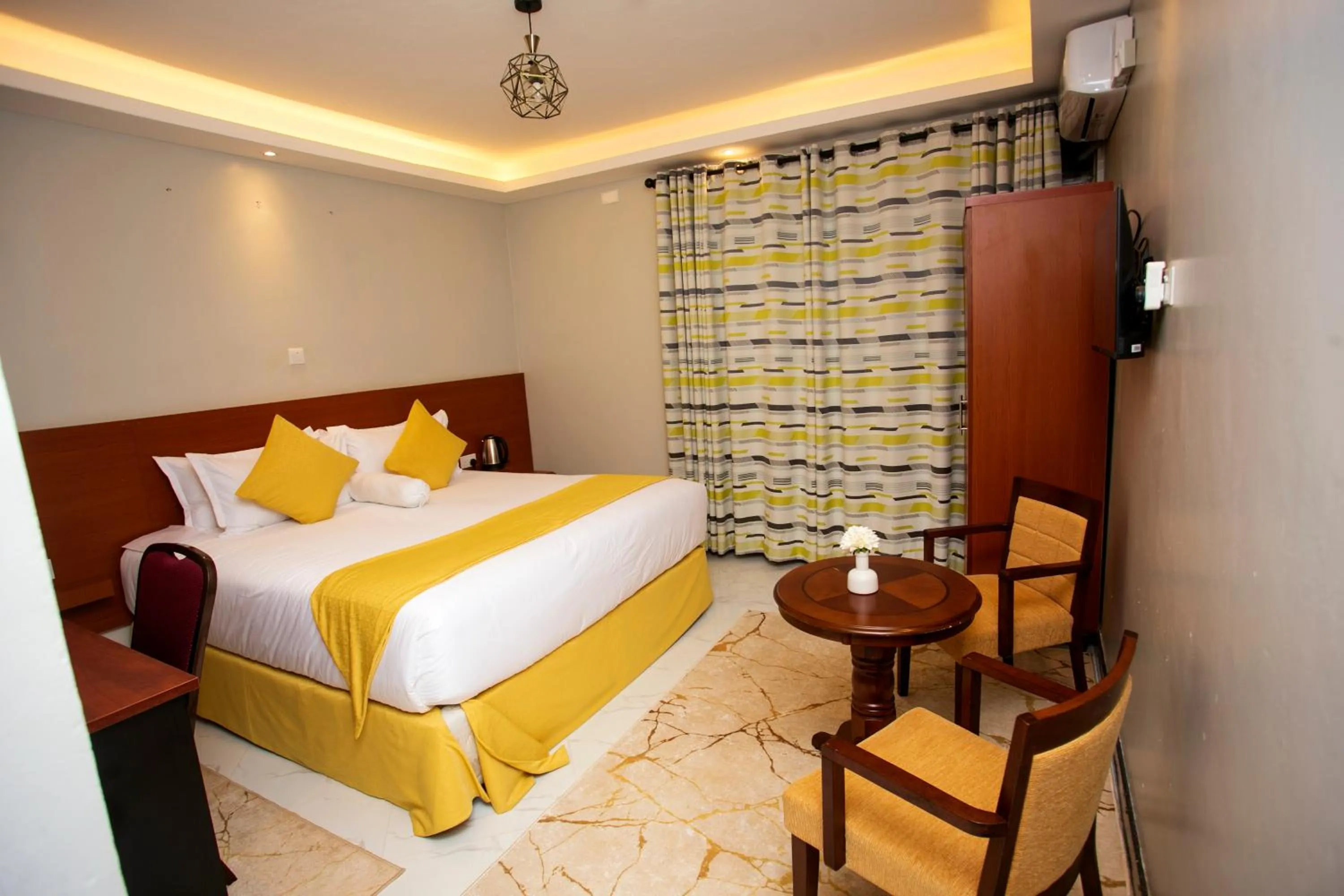 Bed in Kaloni Hotels