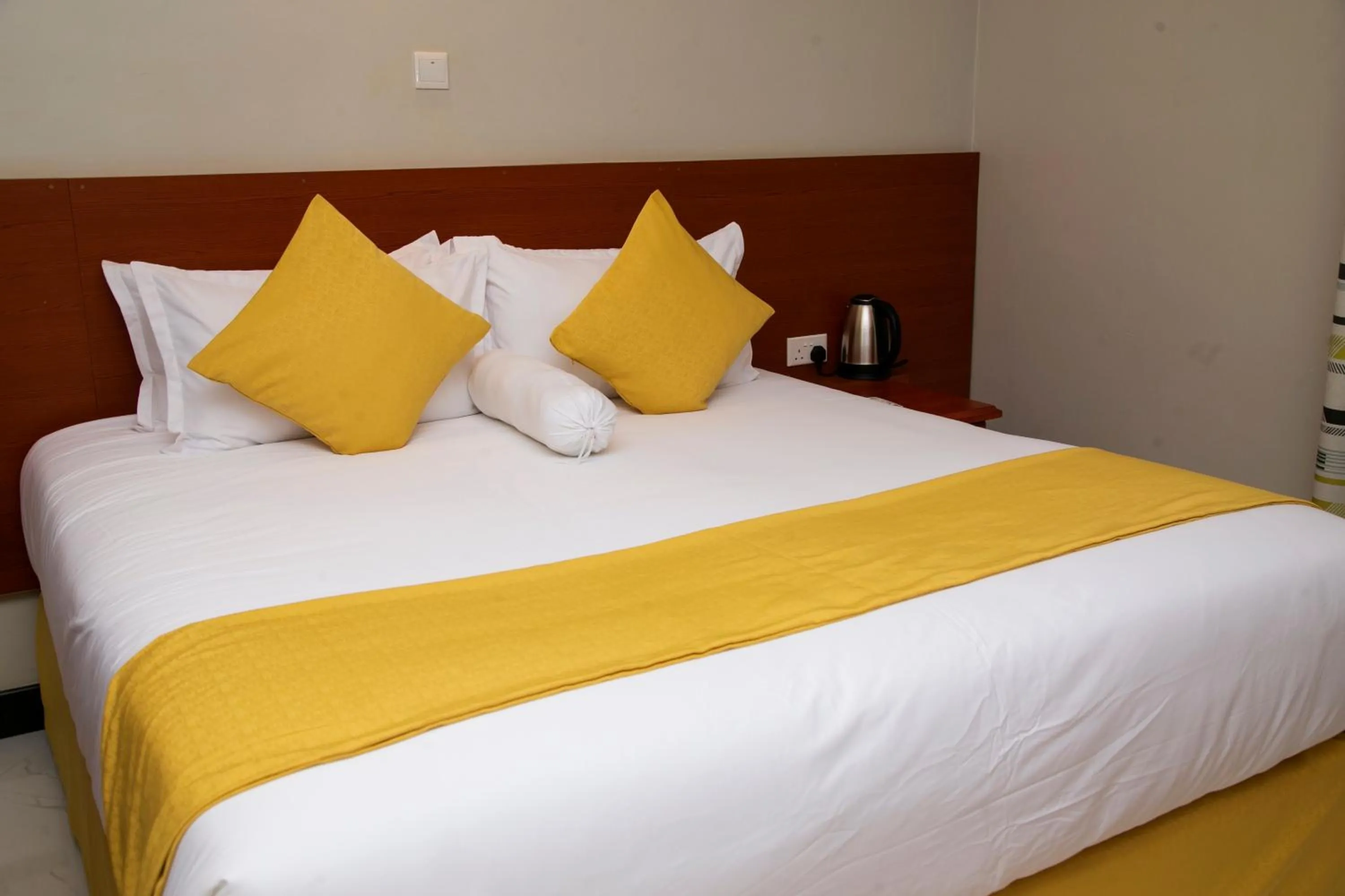 Bed in Kaloni Hotels