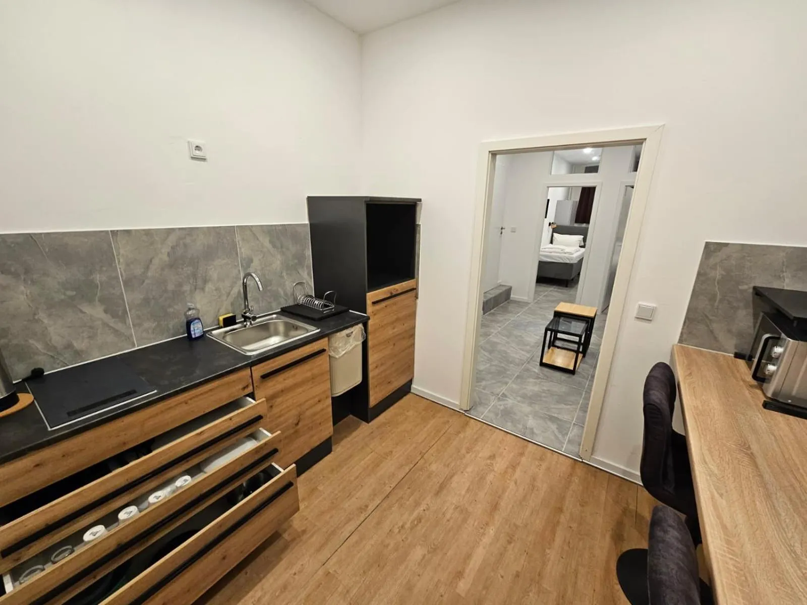 Kitchen or kitchenette in ApartHotel Slumber