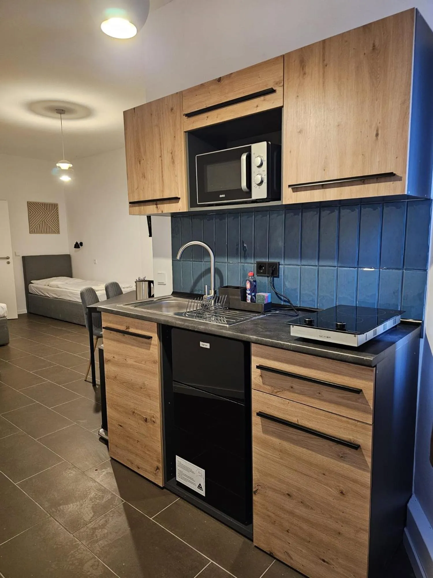 Kitchen or kitchenette in ApartHotel Slumber 24h Self Check in