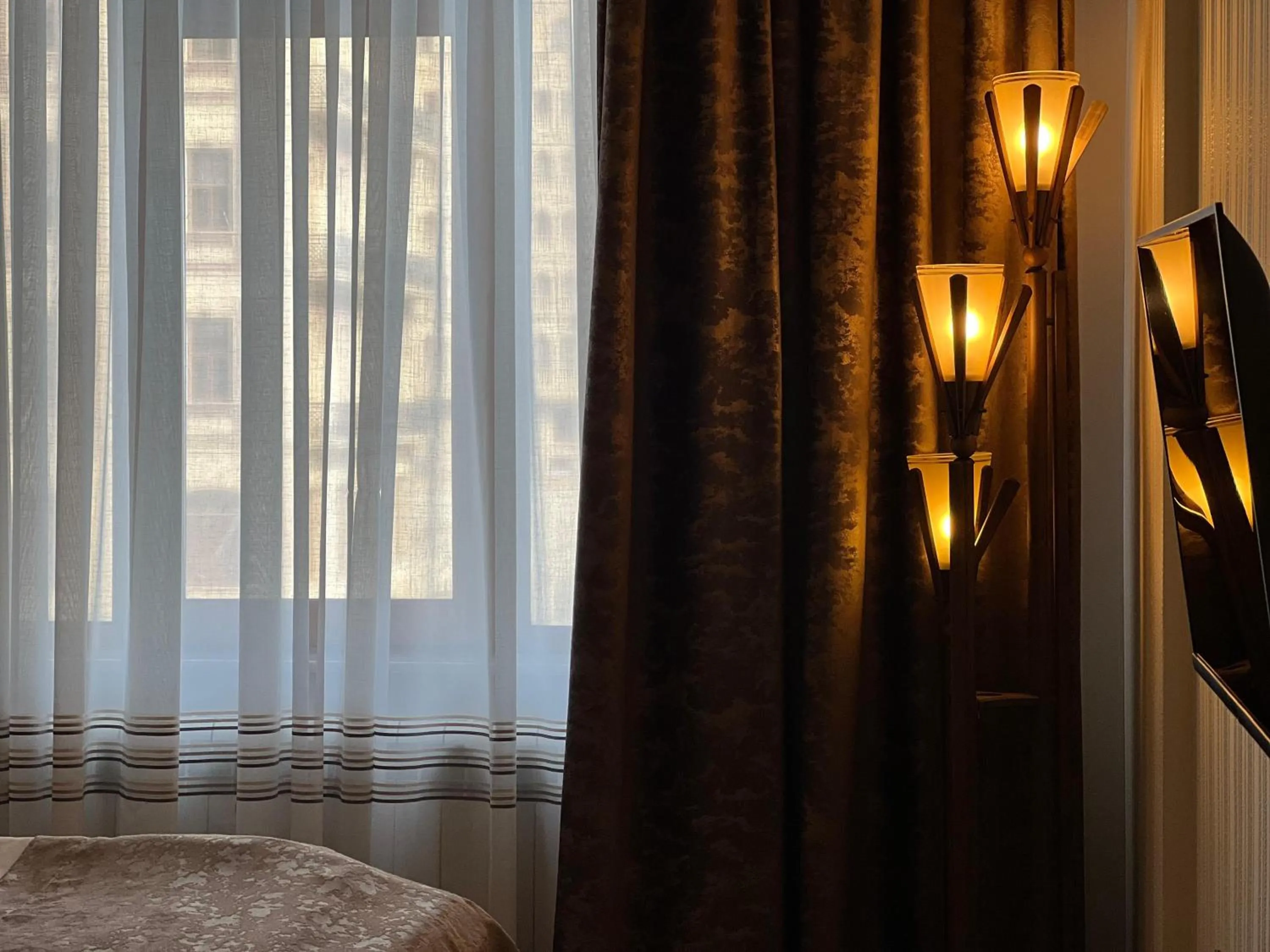 Decorative detail, Bed in Alison Boulevard Hotel