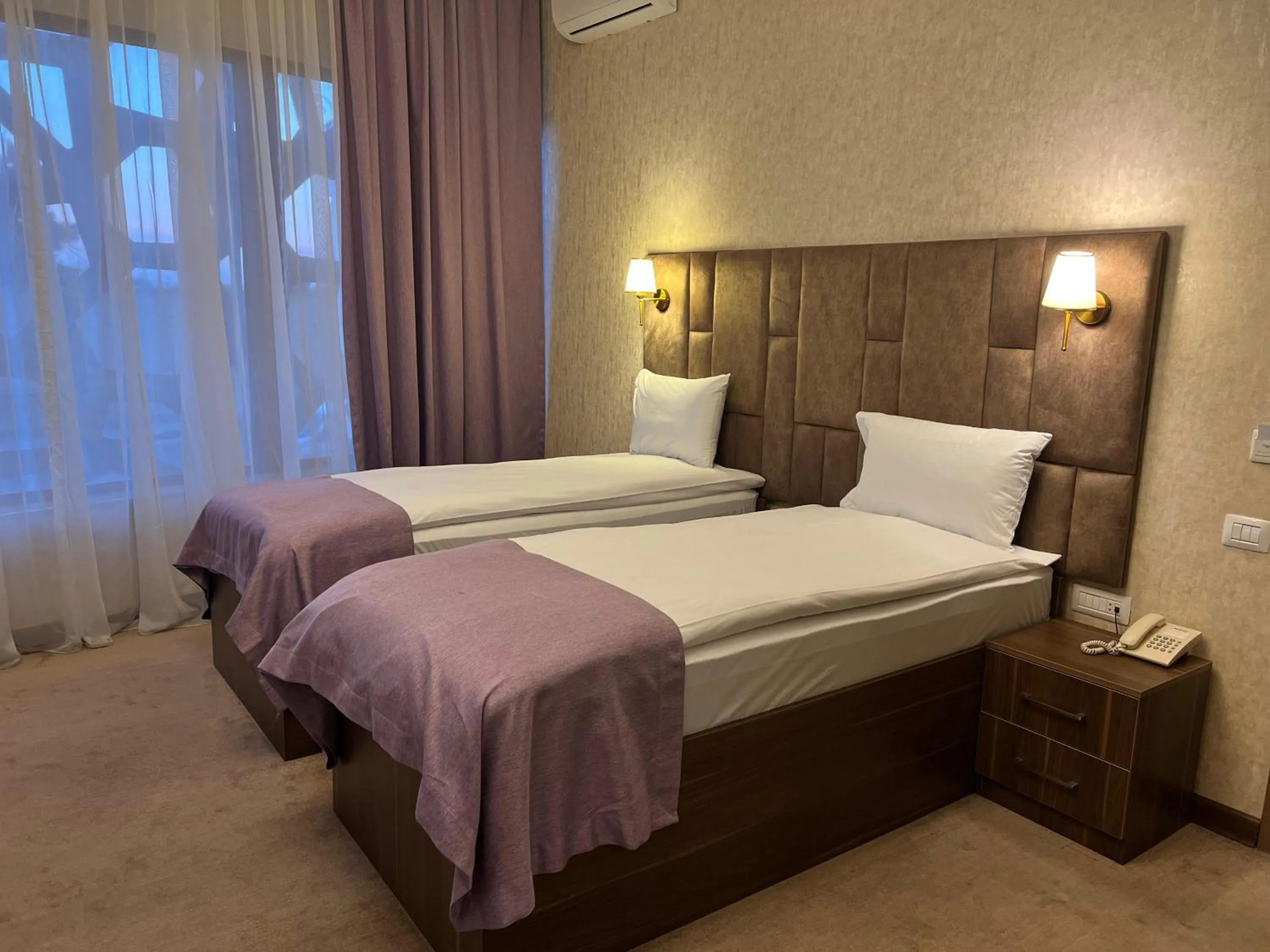 Bed in Alison Boulevard Hotel