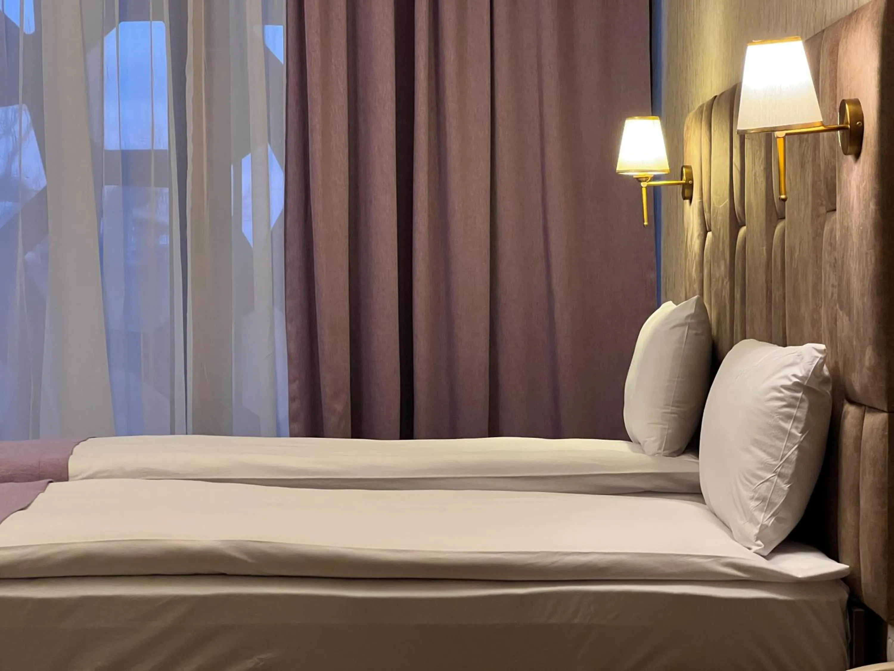 Bed in Alison Boulevard Hotel