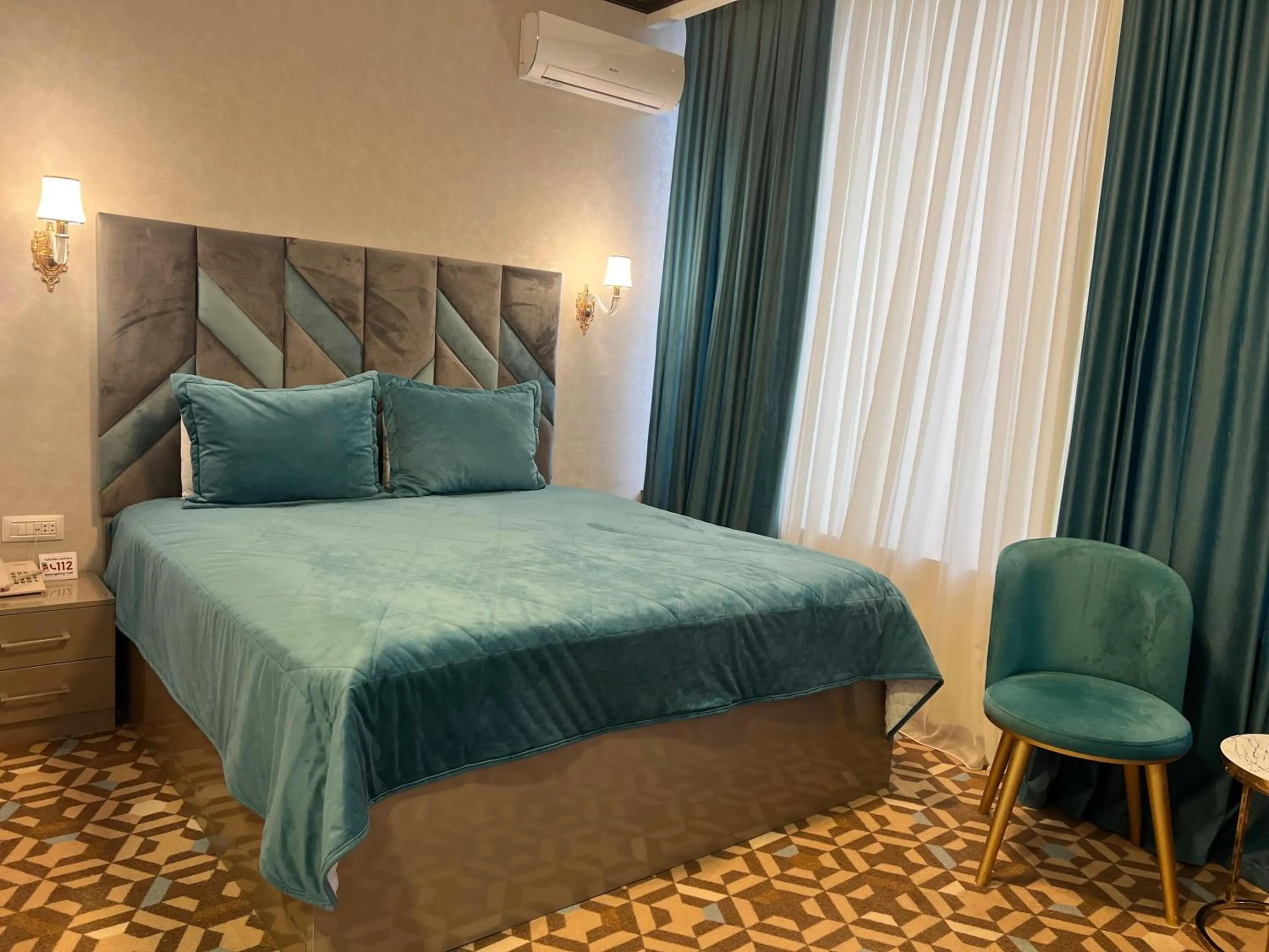 Bed in Alison Boulevard Hotel