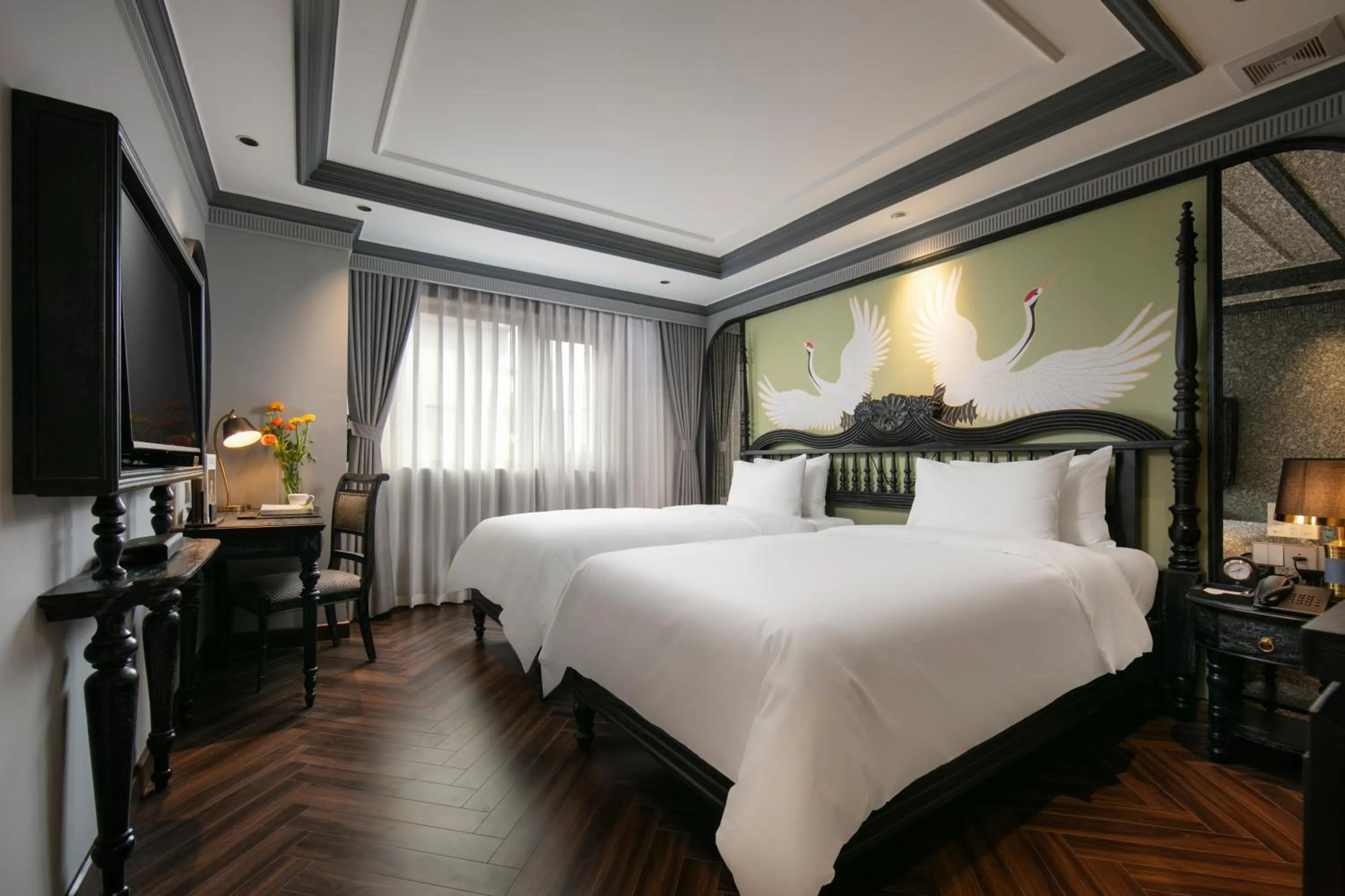 Bed in THE LEGEND HANOI Hotel