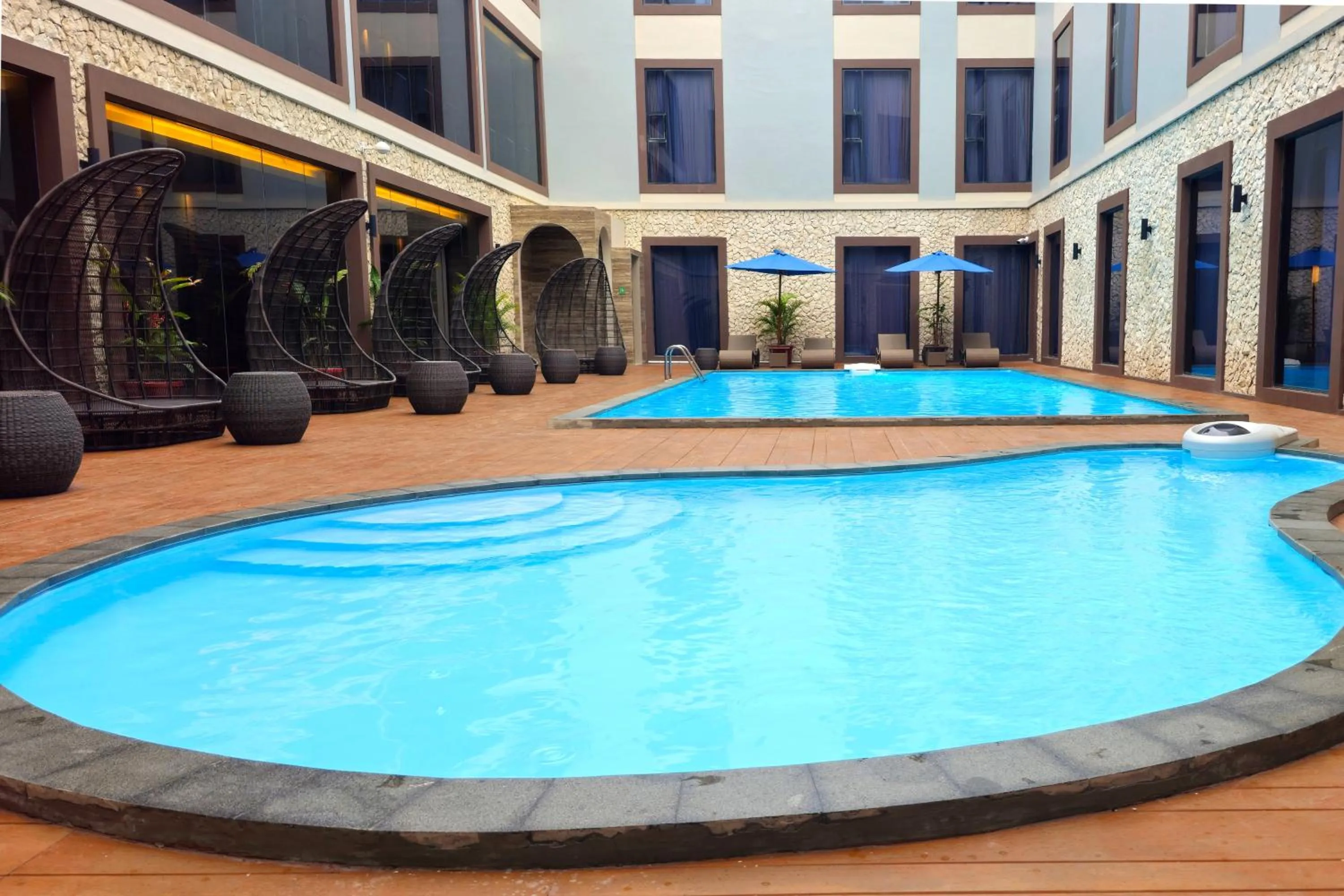 Swimming pool in Swiss-Belinn Indramayu