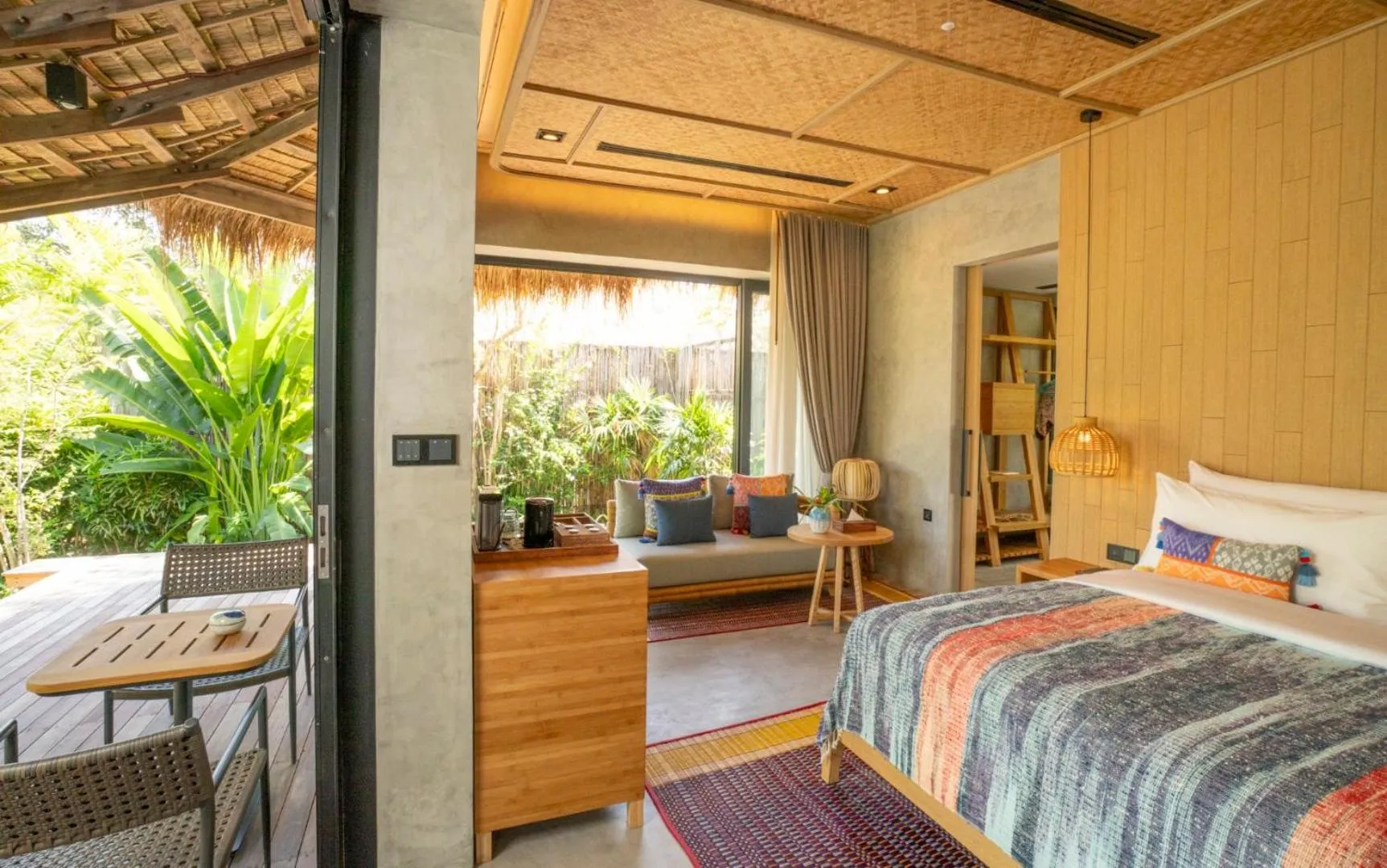 Seating area, Bed in JATI Koh Russey