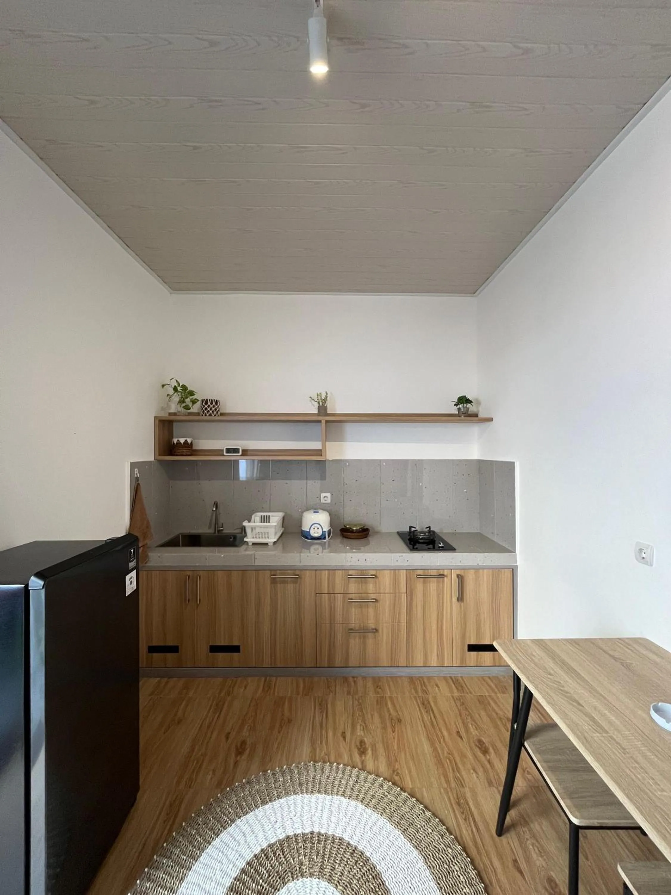 Kitchen or kitchenette in Sampai Living Tugu