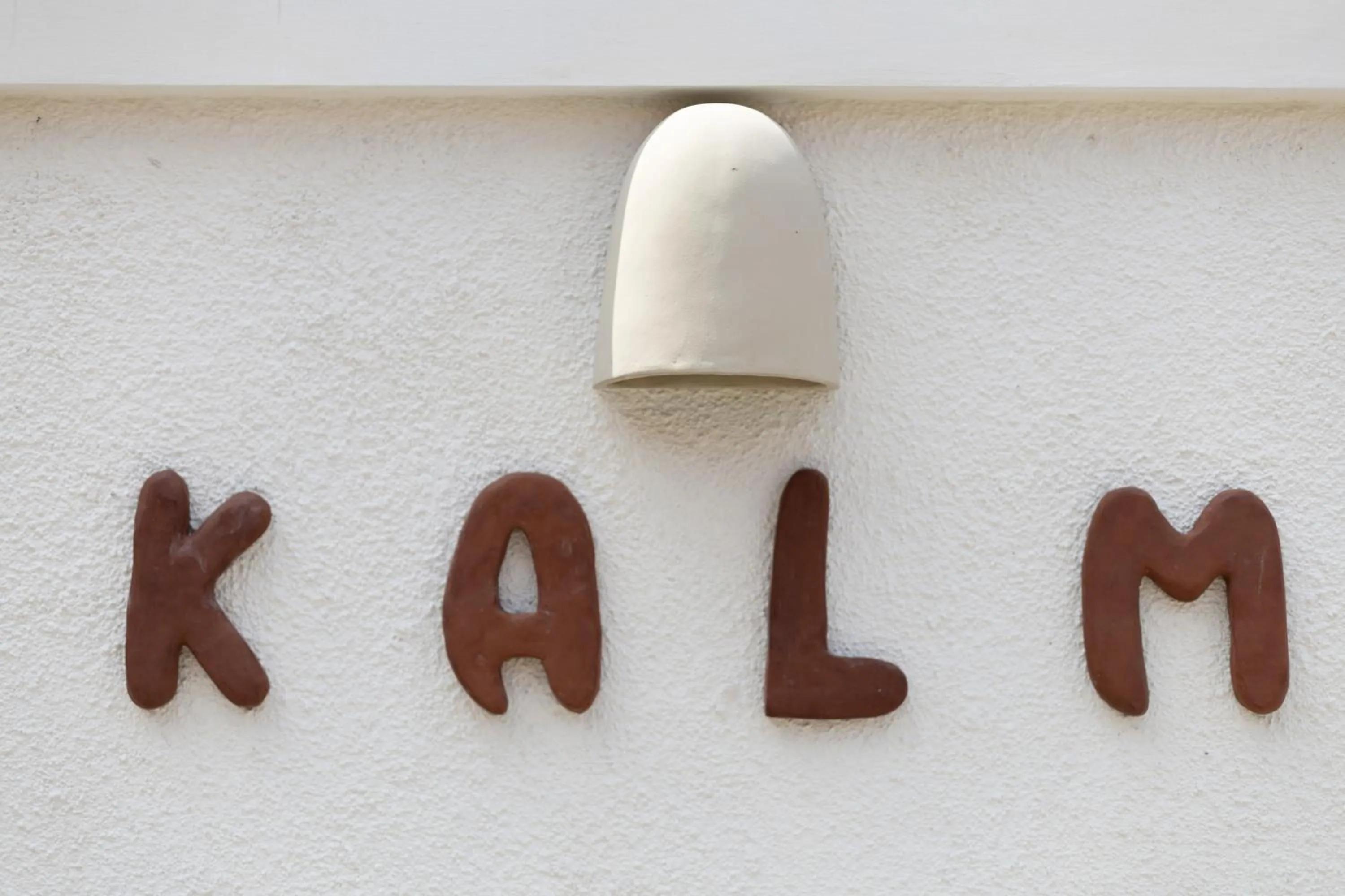 Property logo or sign in KALM Bali