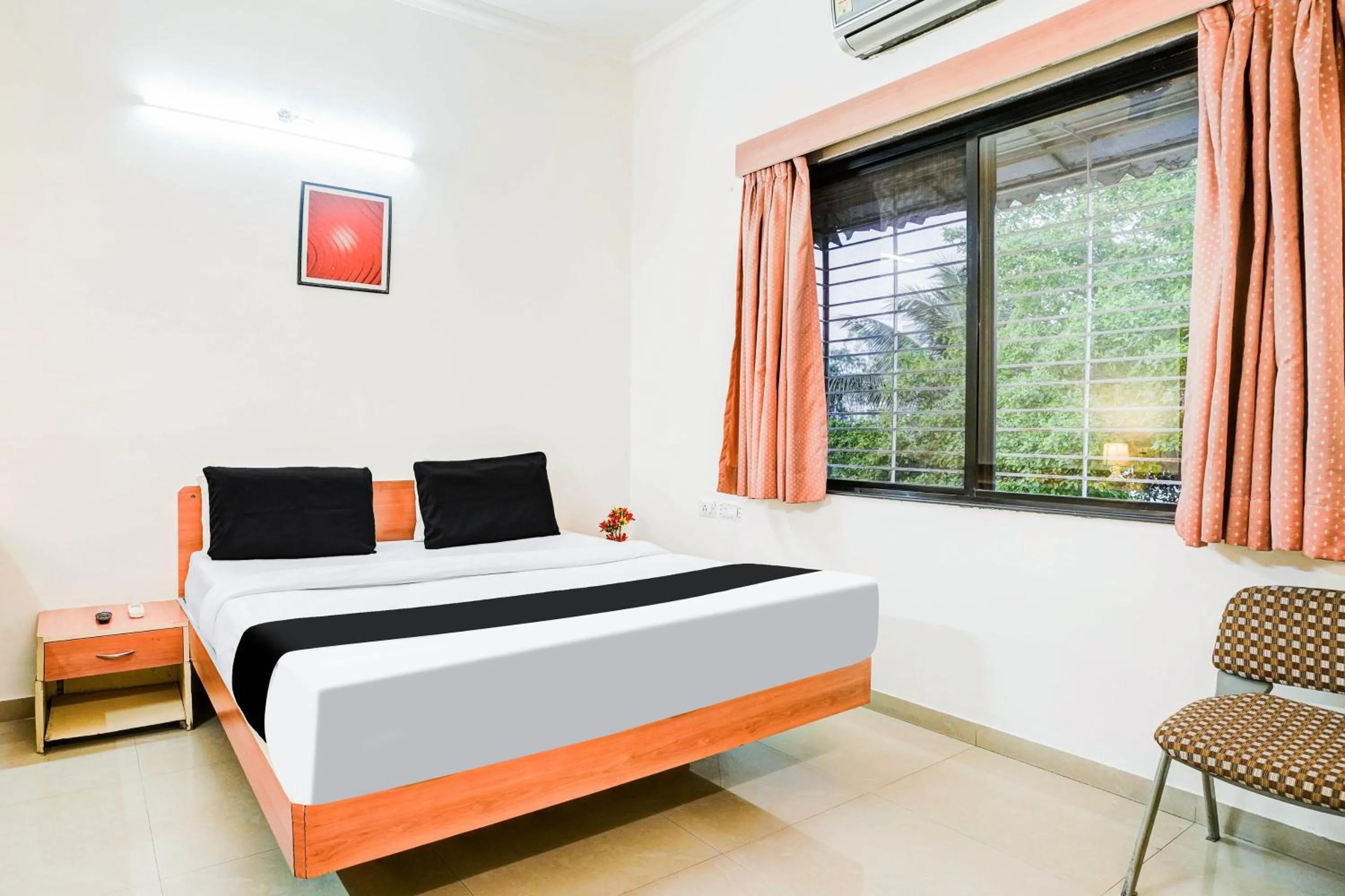 Bedroom, Bed in Super Hotel O Nashik