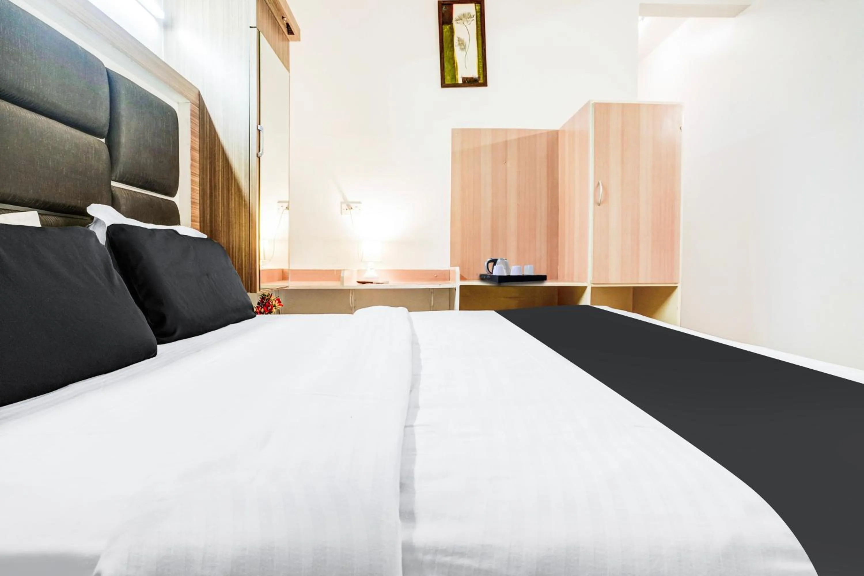 Bedroom, Bed in Super Hotel O Nashik