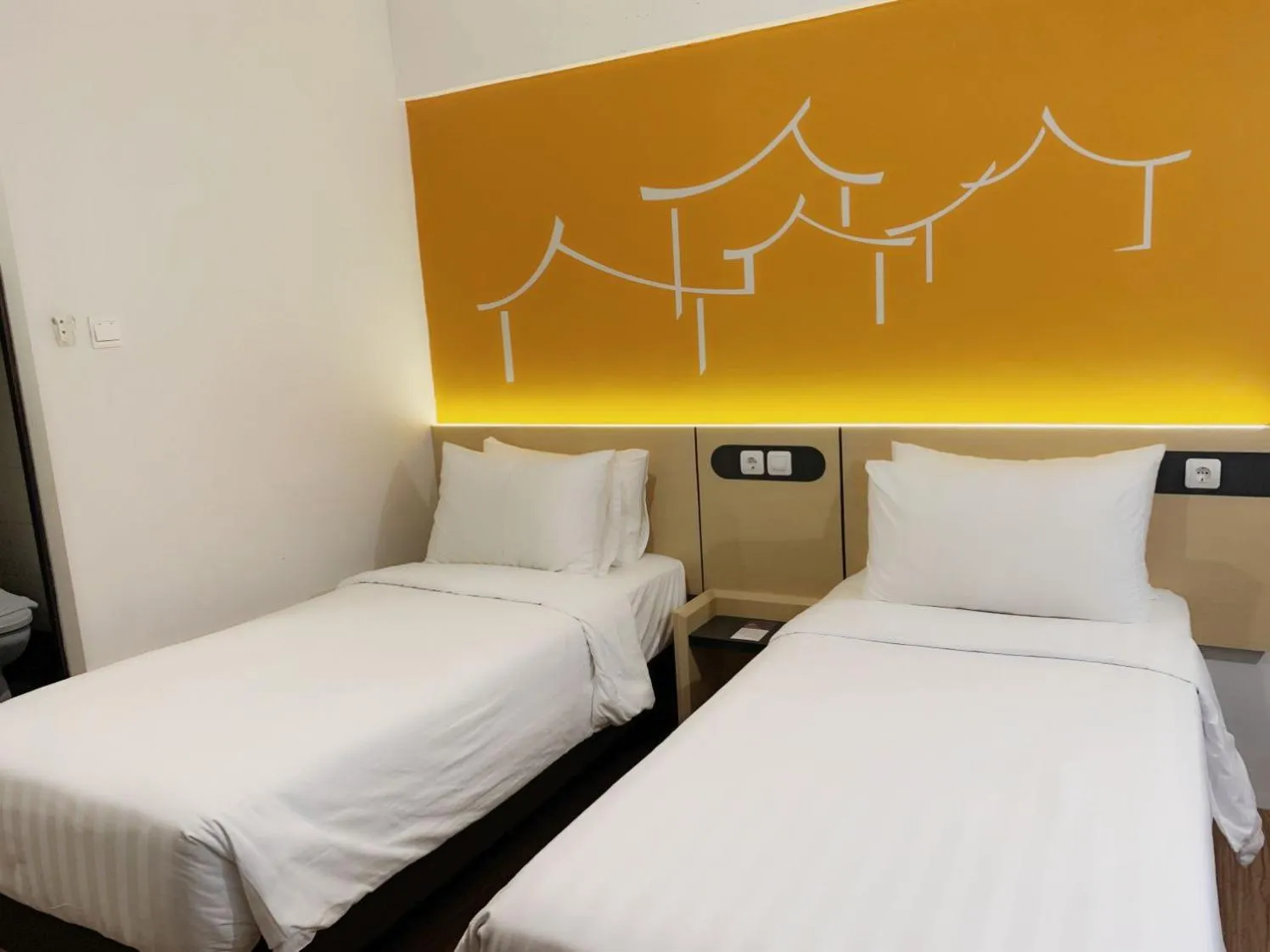 Bed in Nemuru Stay BTC