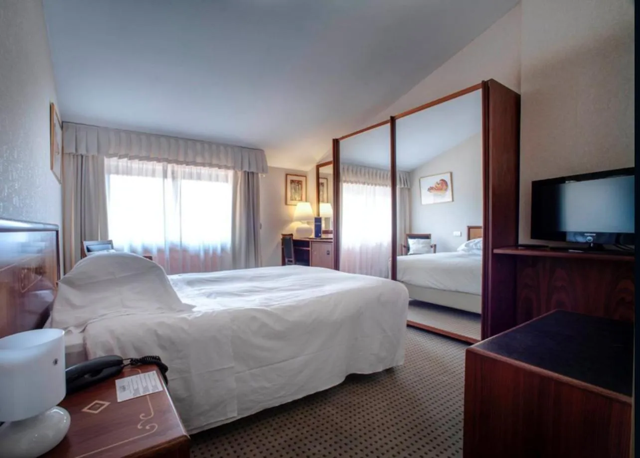 Bed in Arli Hotel Business and Wellness