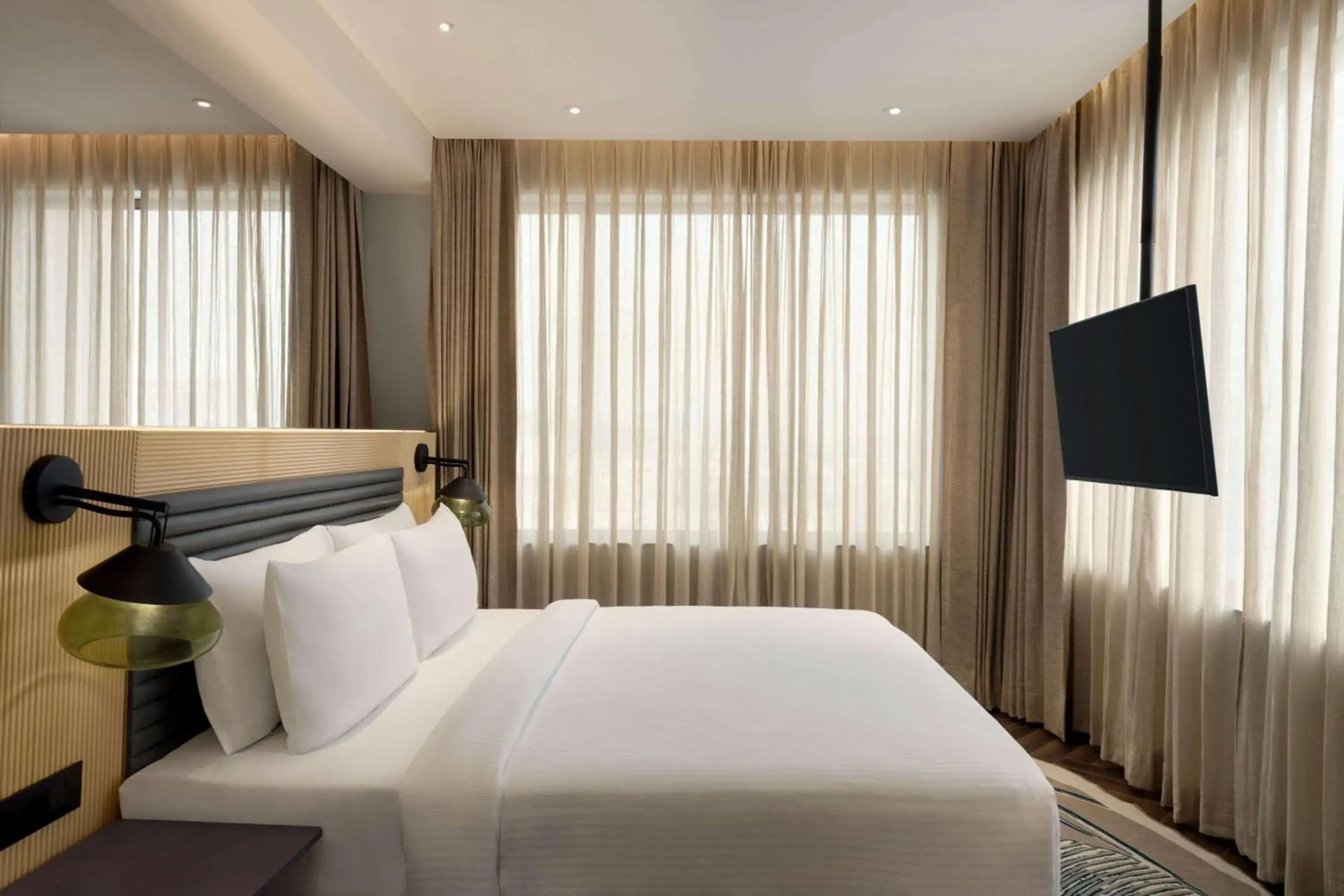 Photo of the whole room, Bed in Ramada Encore By Wyndham Bhiwadi Phool Bagh Chowk Photo of the whole room, Bed in Ramada Encore By Wyndham Bhiwadi Phool Bagh Chowk