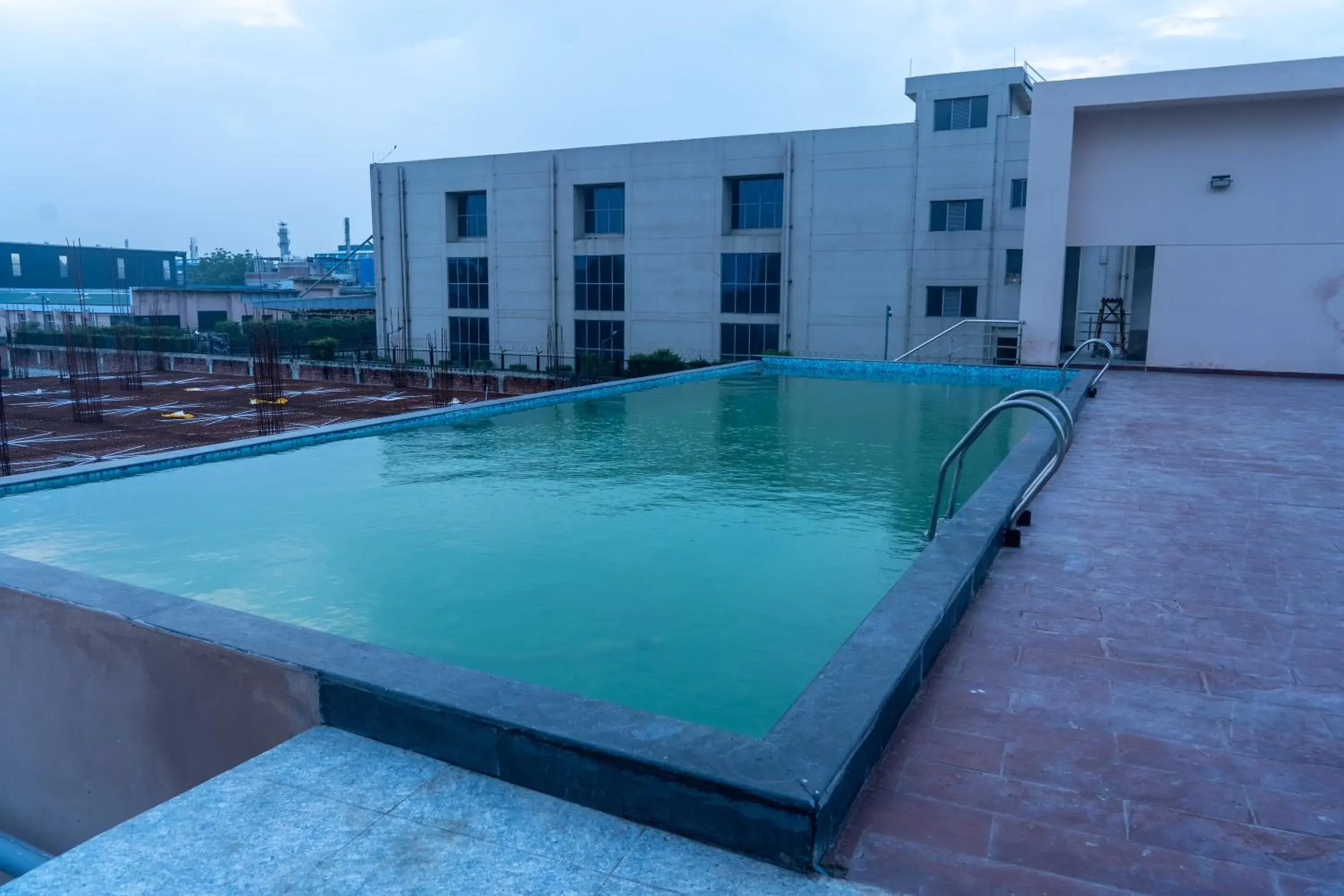 Swimming pool in Ramada Encore By Wyndham Bhiwadi Phool Bagh Chowk Swimming pool in Ramada Encore By Wyndham Bhiwadi Phool Bagh Chowk