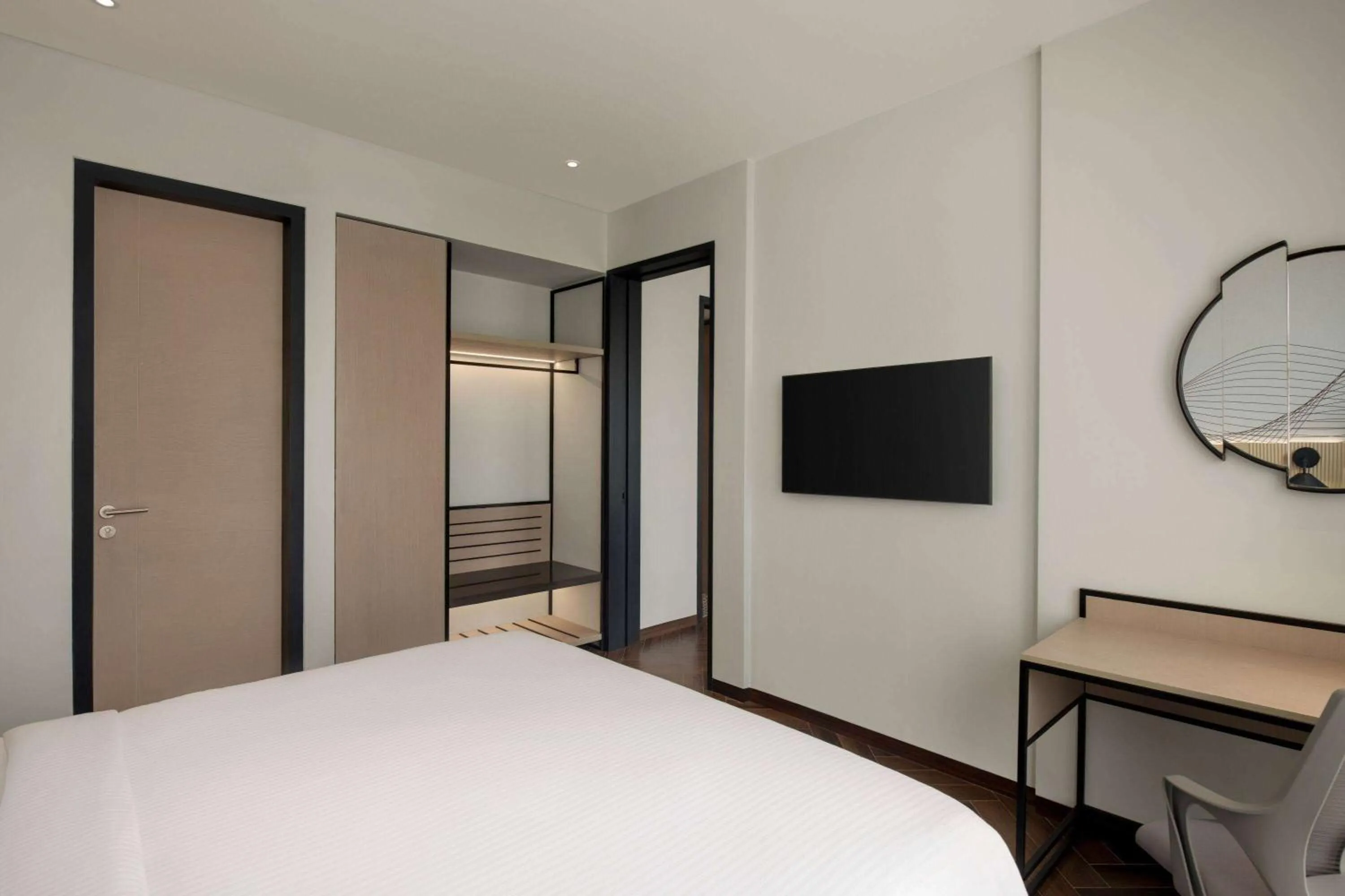 Photo of the whole room, Bed in Ramada Encore By Wyndham Bhiwadi Phool Bagh Chowk