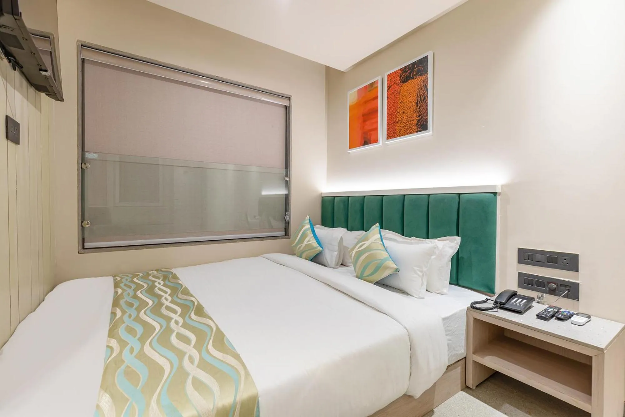 Bed in FabHotel Red Vibe