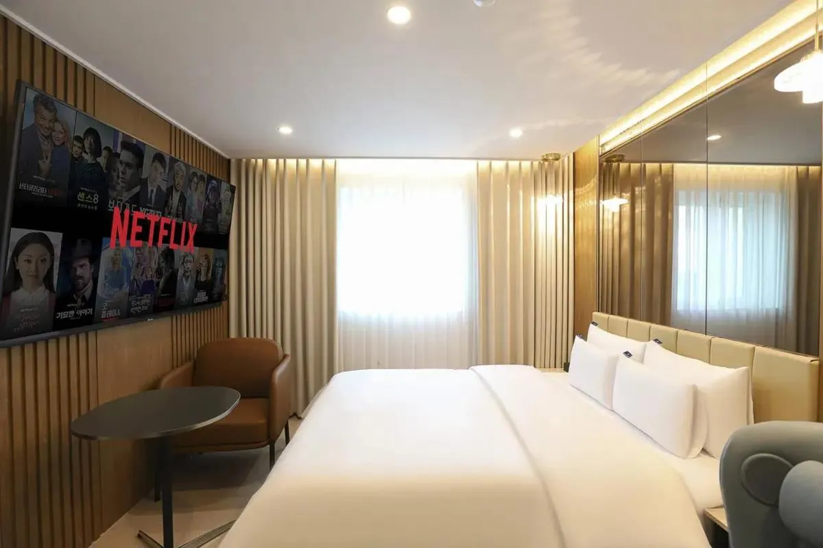 Bed in Rosy Hotel