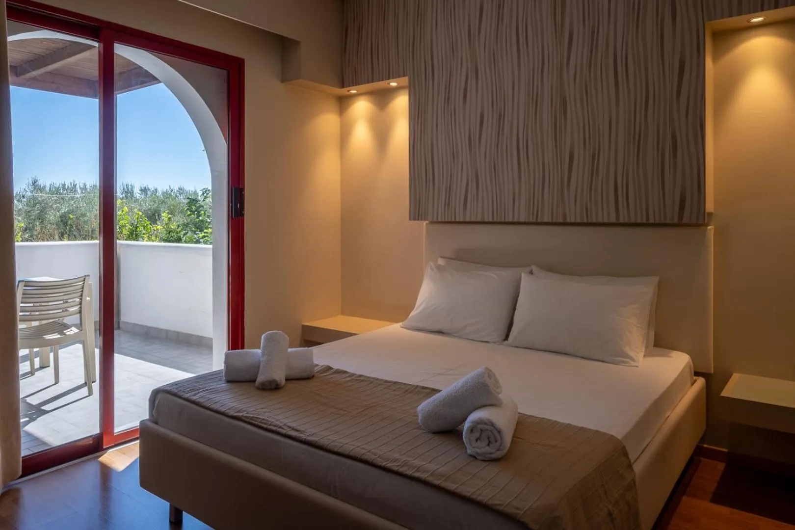 Bed in Triantafillas Suites