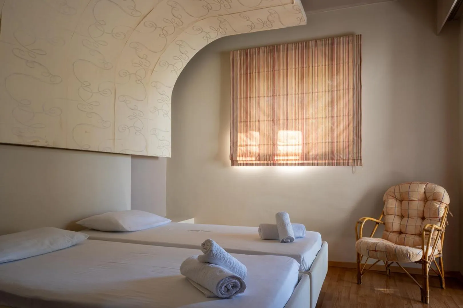 Bed in Triantafillas Suites