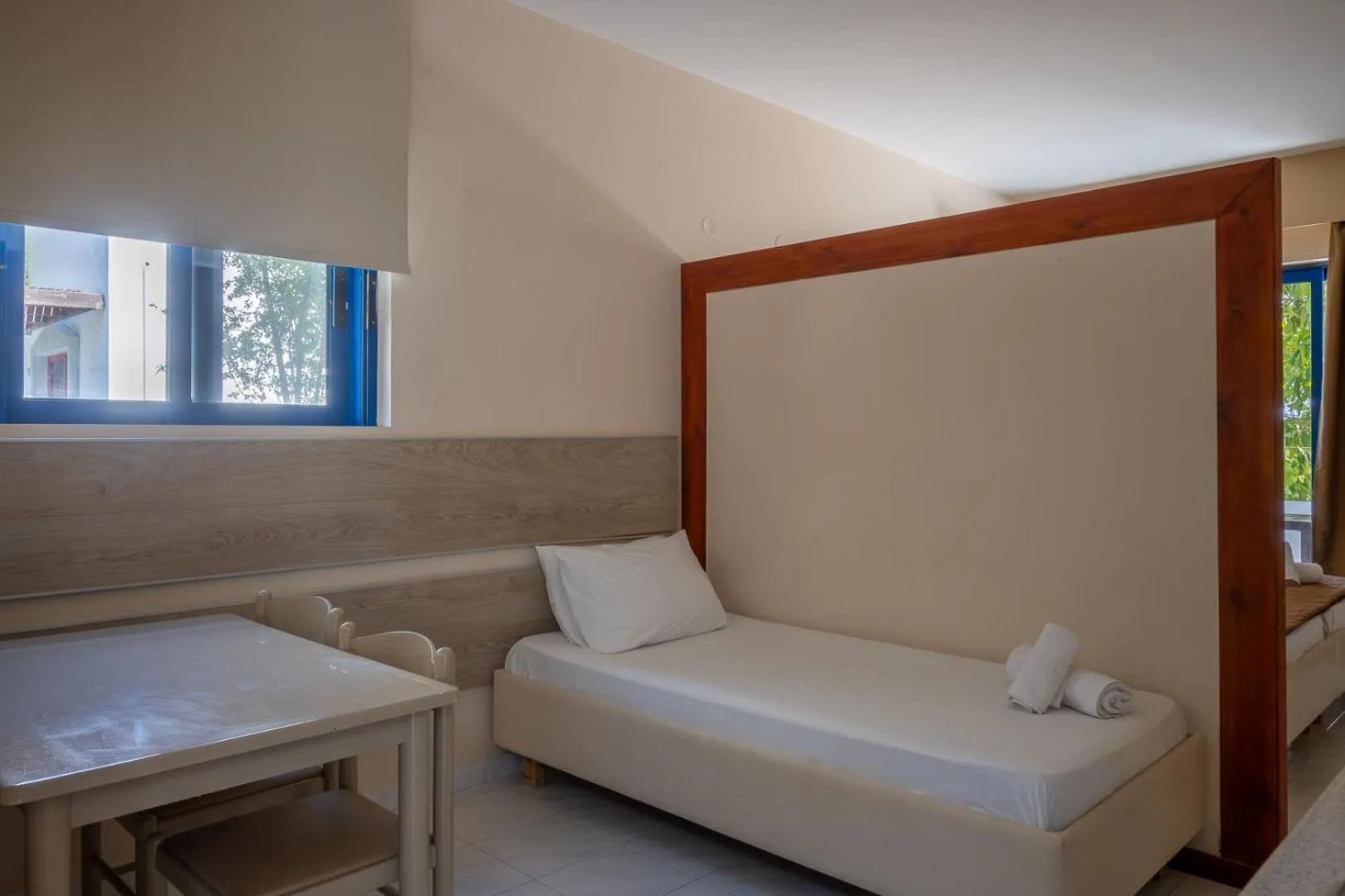 Bed in Triantafillas Suites