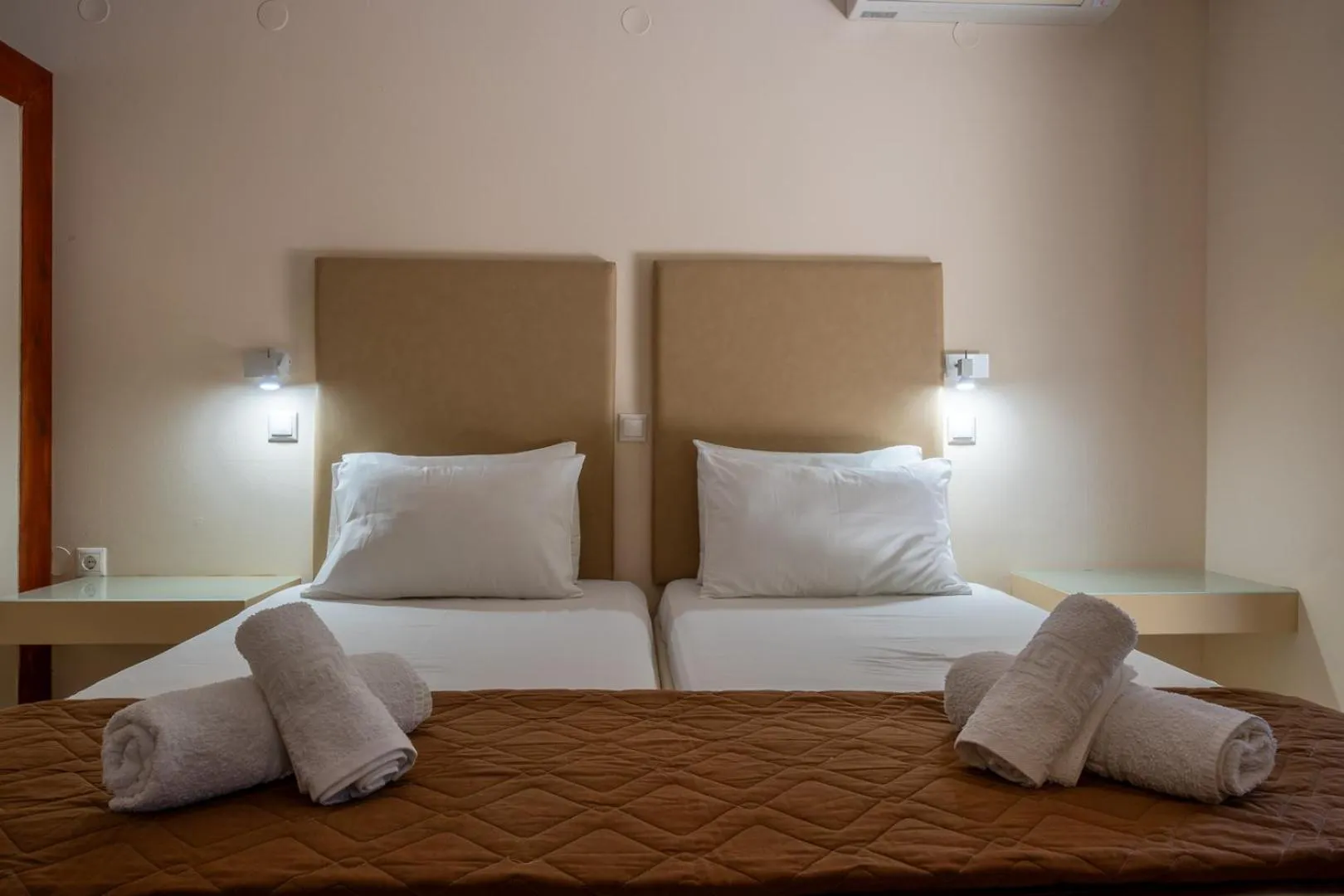 Bed in Triantafillas Suites