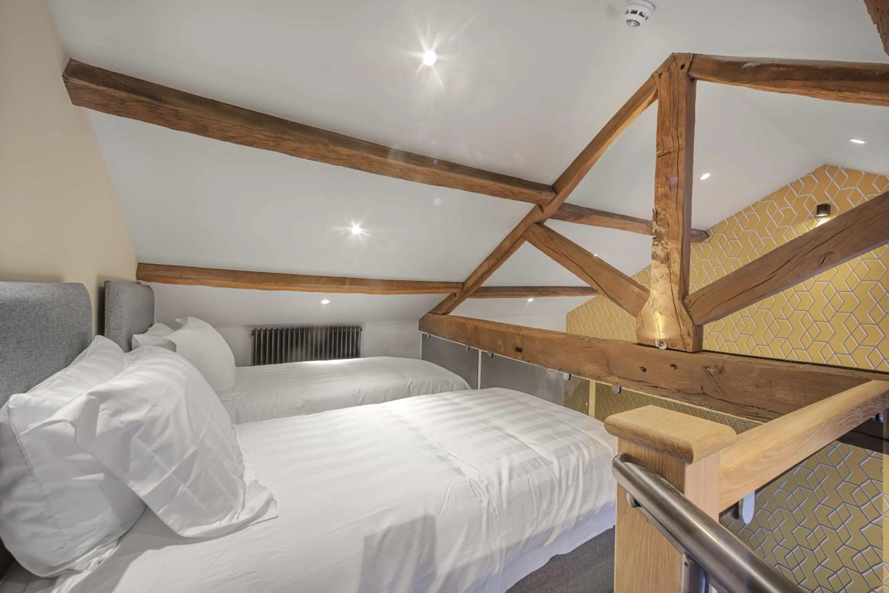 Bed in Rooms at The Vault