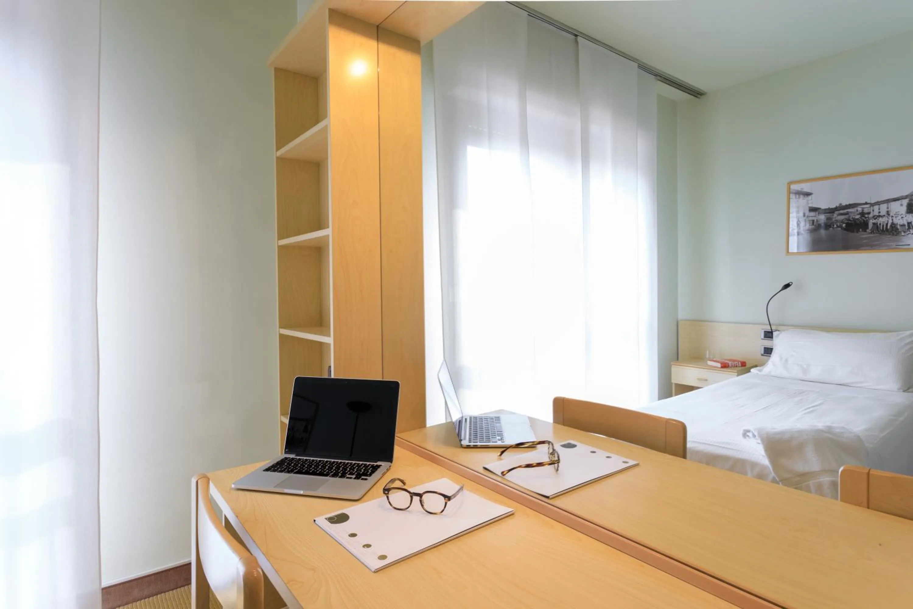 Bed in Brianteo Hotel Residence and Restaurant