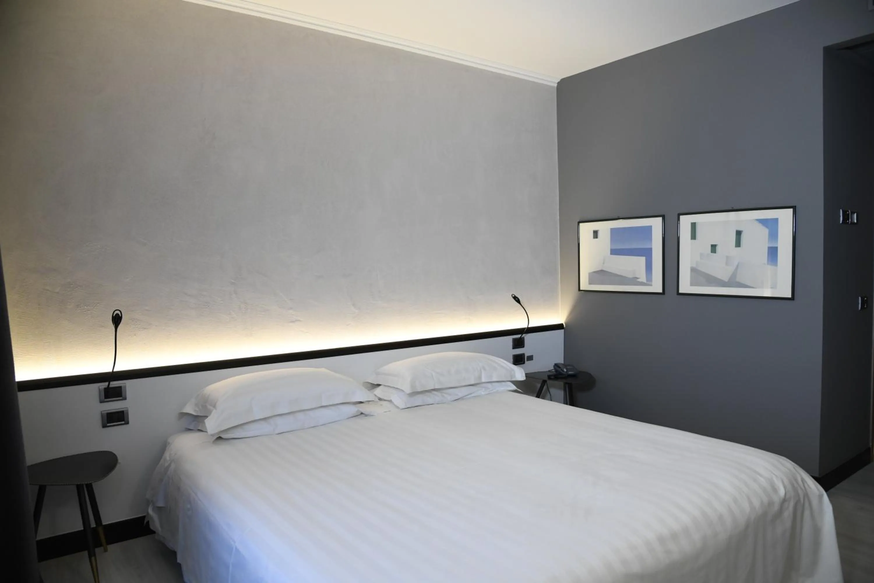 Bed in Brianteo Hotel Residence and Restaurant