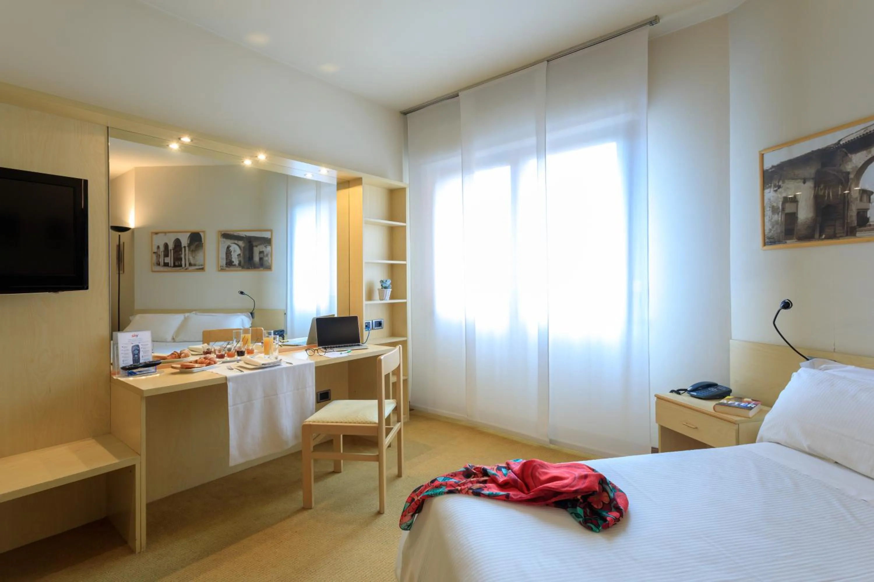 Bed in Brianteo Hotel Residence and Restaurant