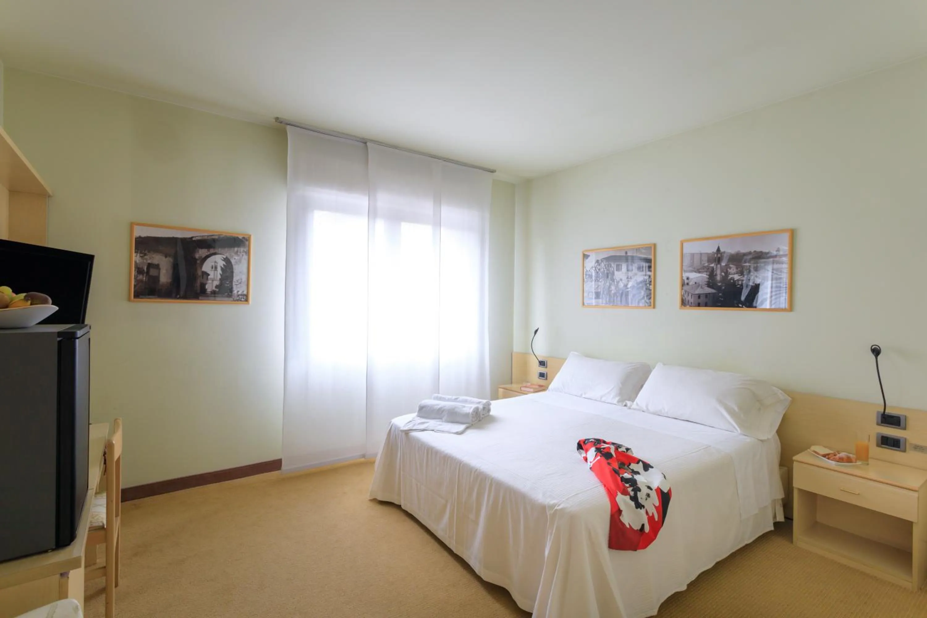 Bed in Brianteo Hotel Residence and Restaurant